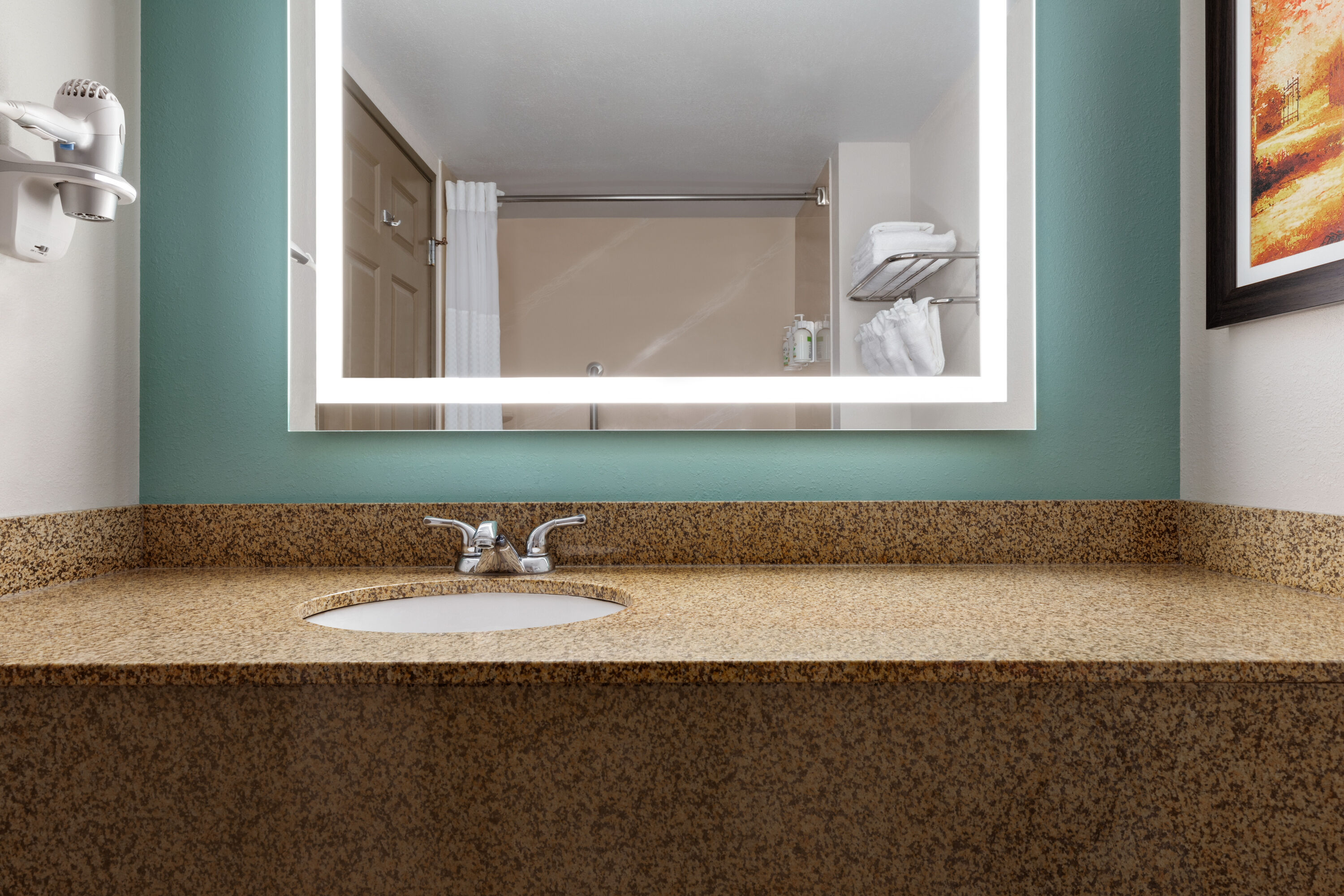 Guest room bath at the Wingate by Wyndham Louisville East in Louisville, Kentucky