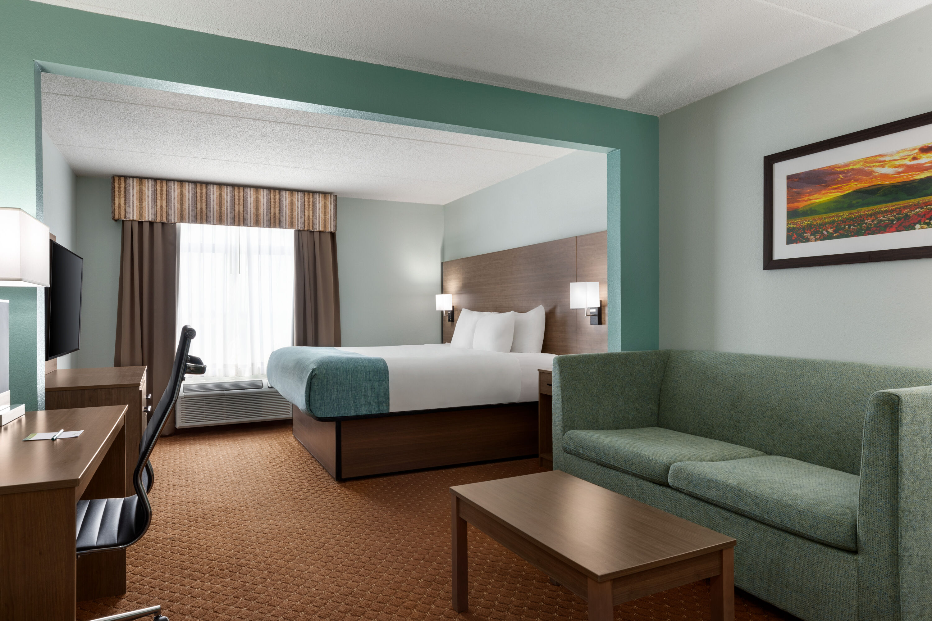 Guest room at the Wingate by Wyndham Louisville East in Louisville, Kentucky