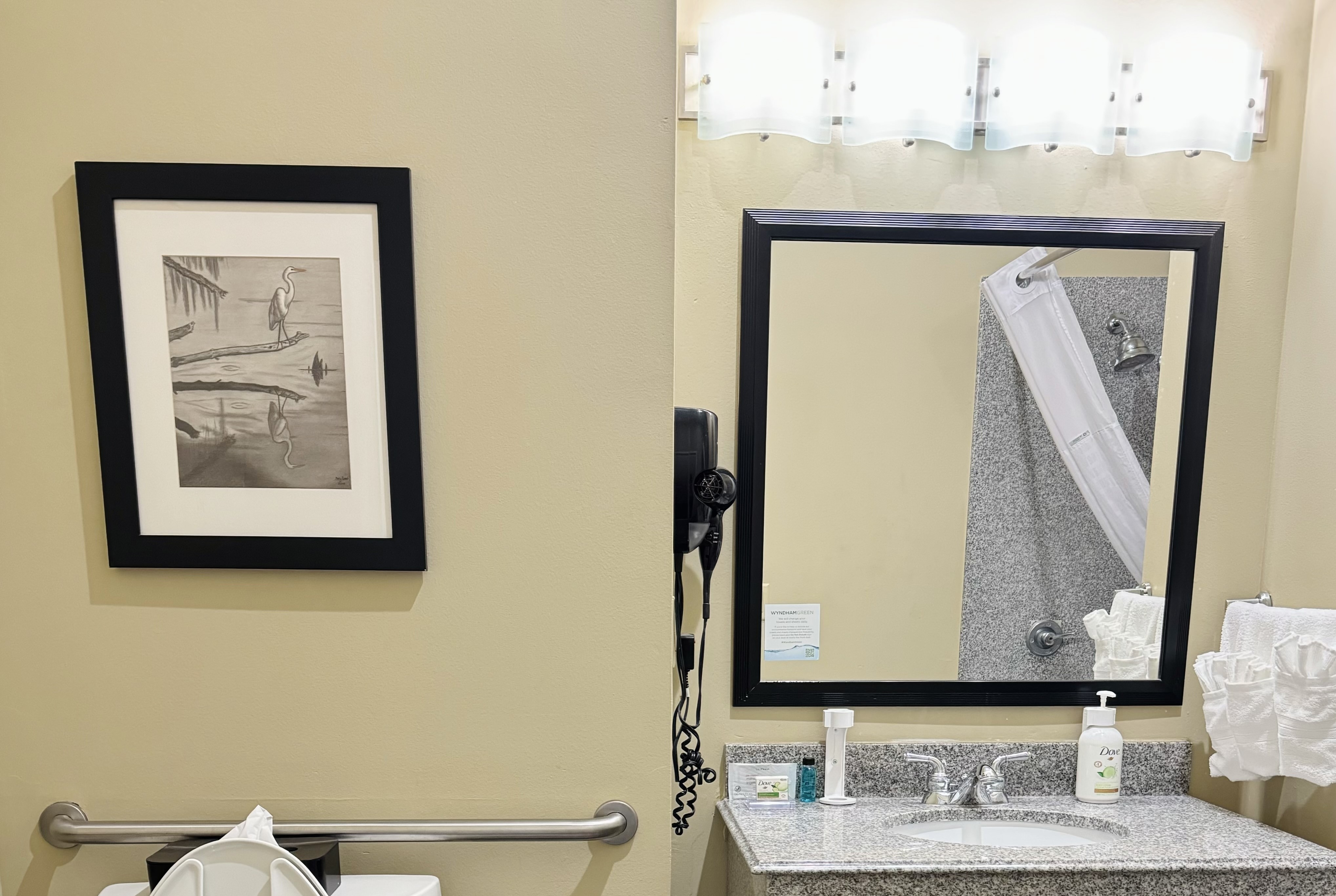 Guest room bath at the Wingate by Wyndham Lake Charles Casino Area in Lake Charles, Louisiana