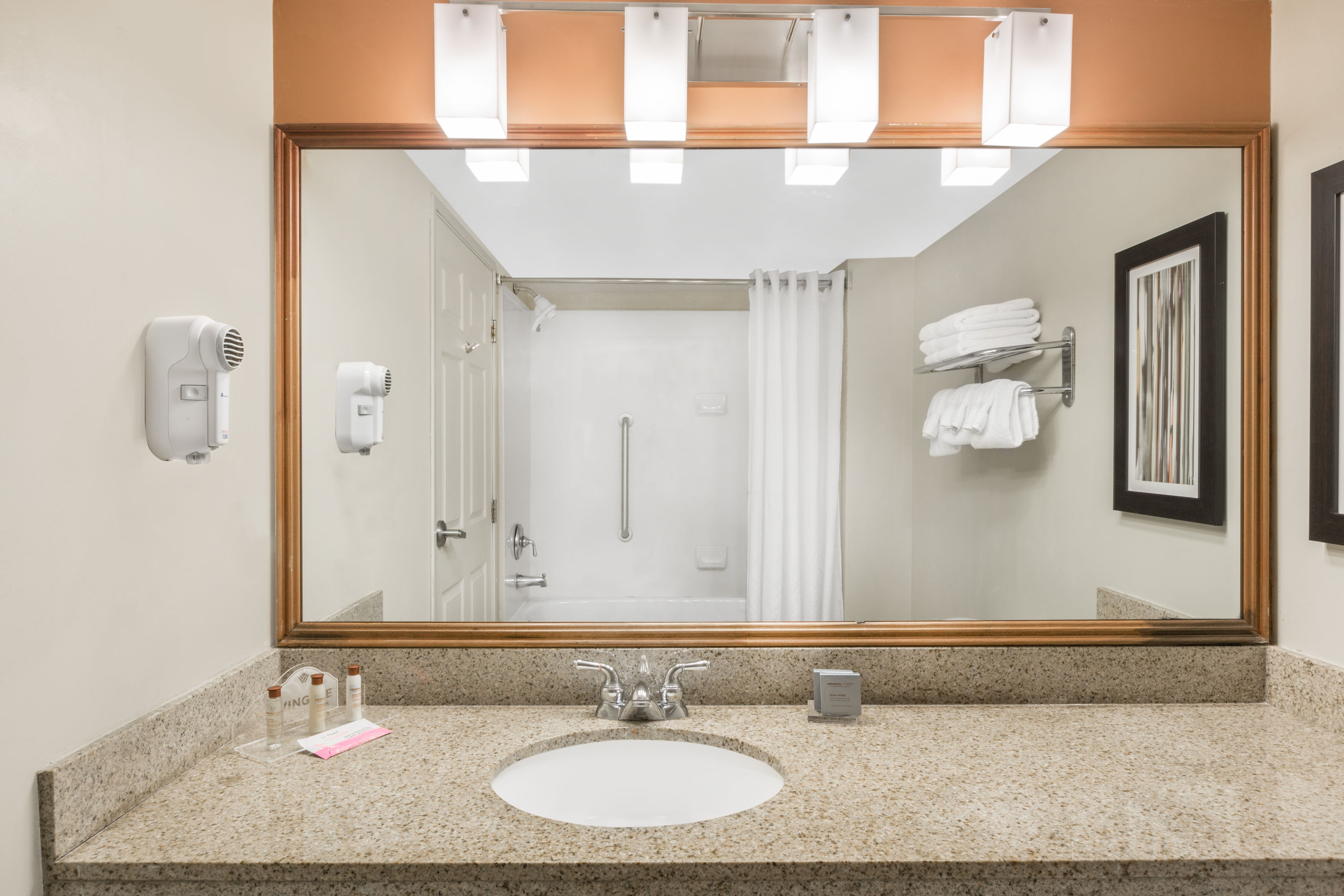 Guest room bath at the Wingate by Wyndham West Monroe in West Monroe, Louisiana