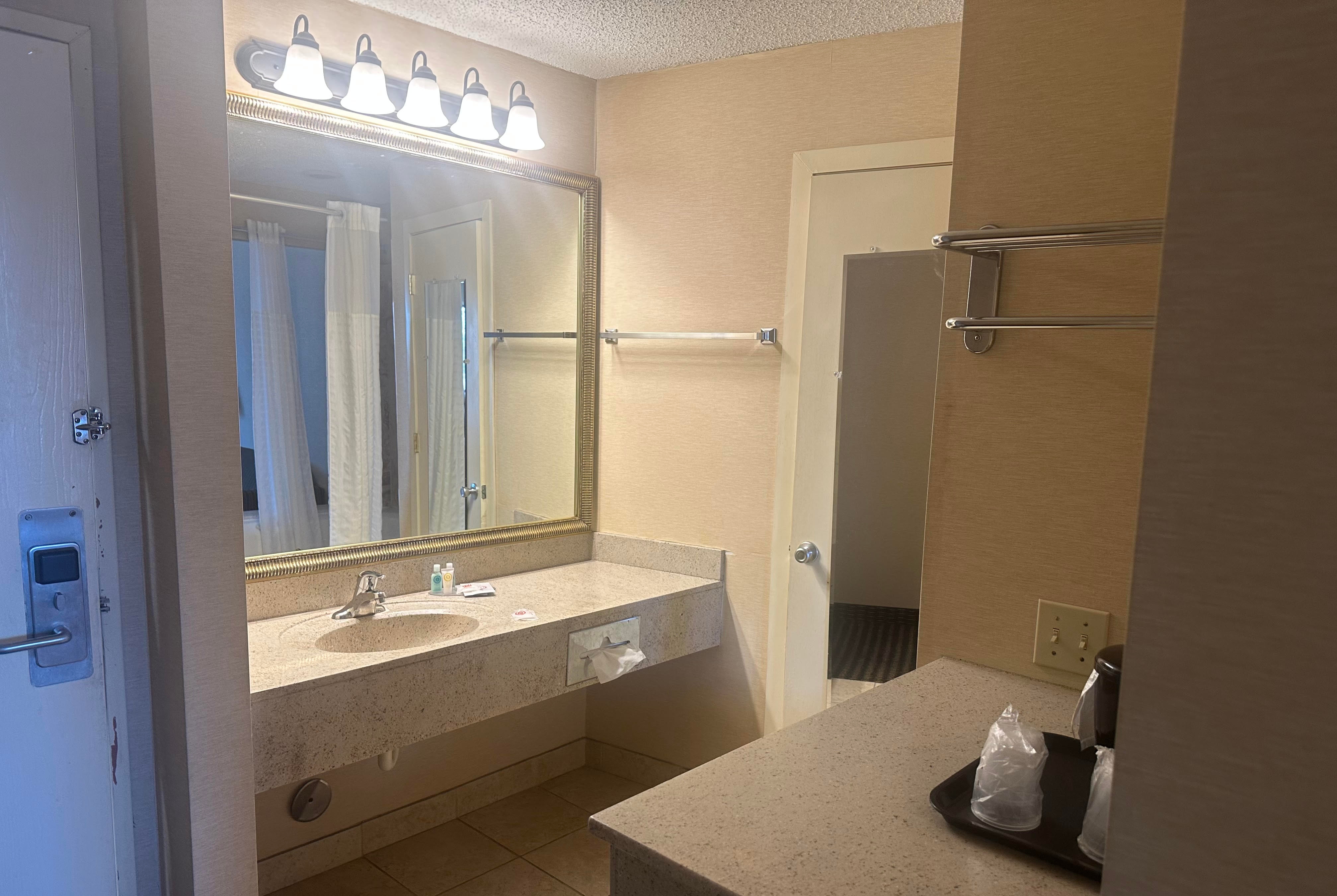 Guest room bath at the Wingate by Wyndham Livonia in Livonia, Michigan