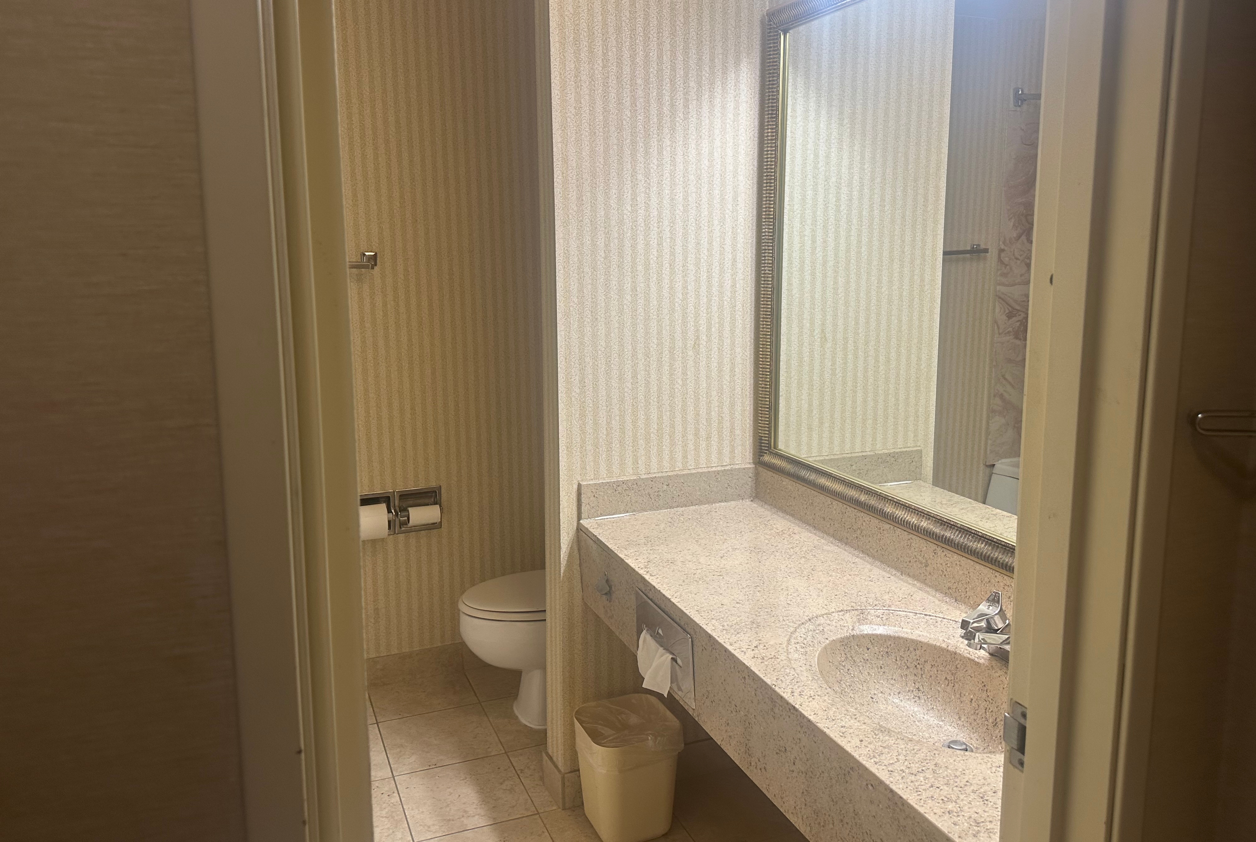 Guest room bath at the Wingate by Wyndham Livonia in Livonia, Michigan
