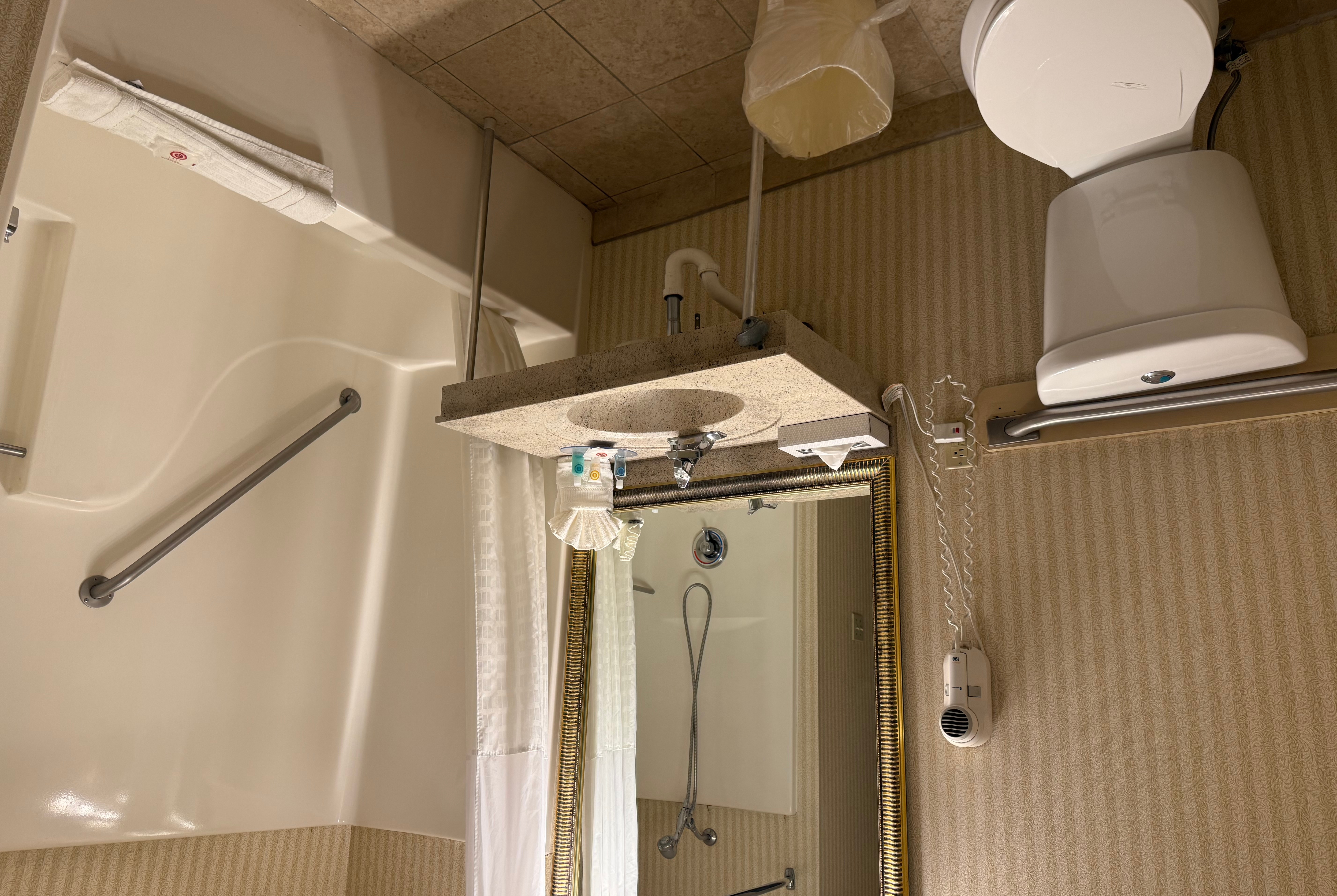 Guest room bath at the Wingate by Wyndham Livonia in Livonia, Michigan