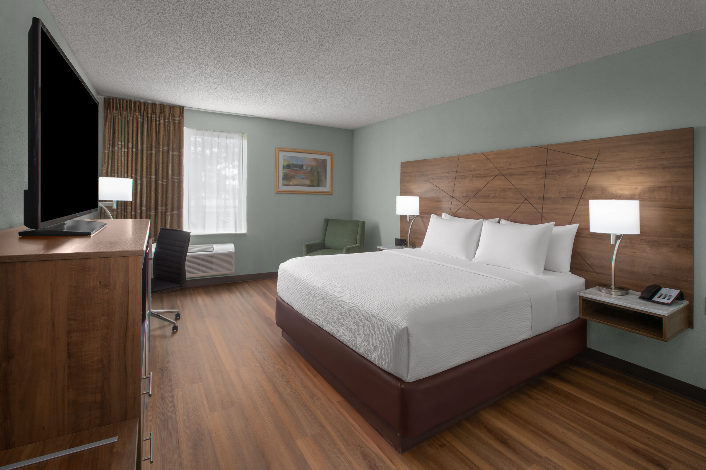 Guest room at the Wingate by Wyndham Livonia in Livonia, Michigan