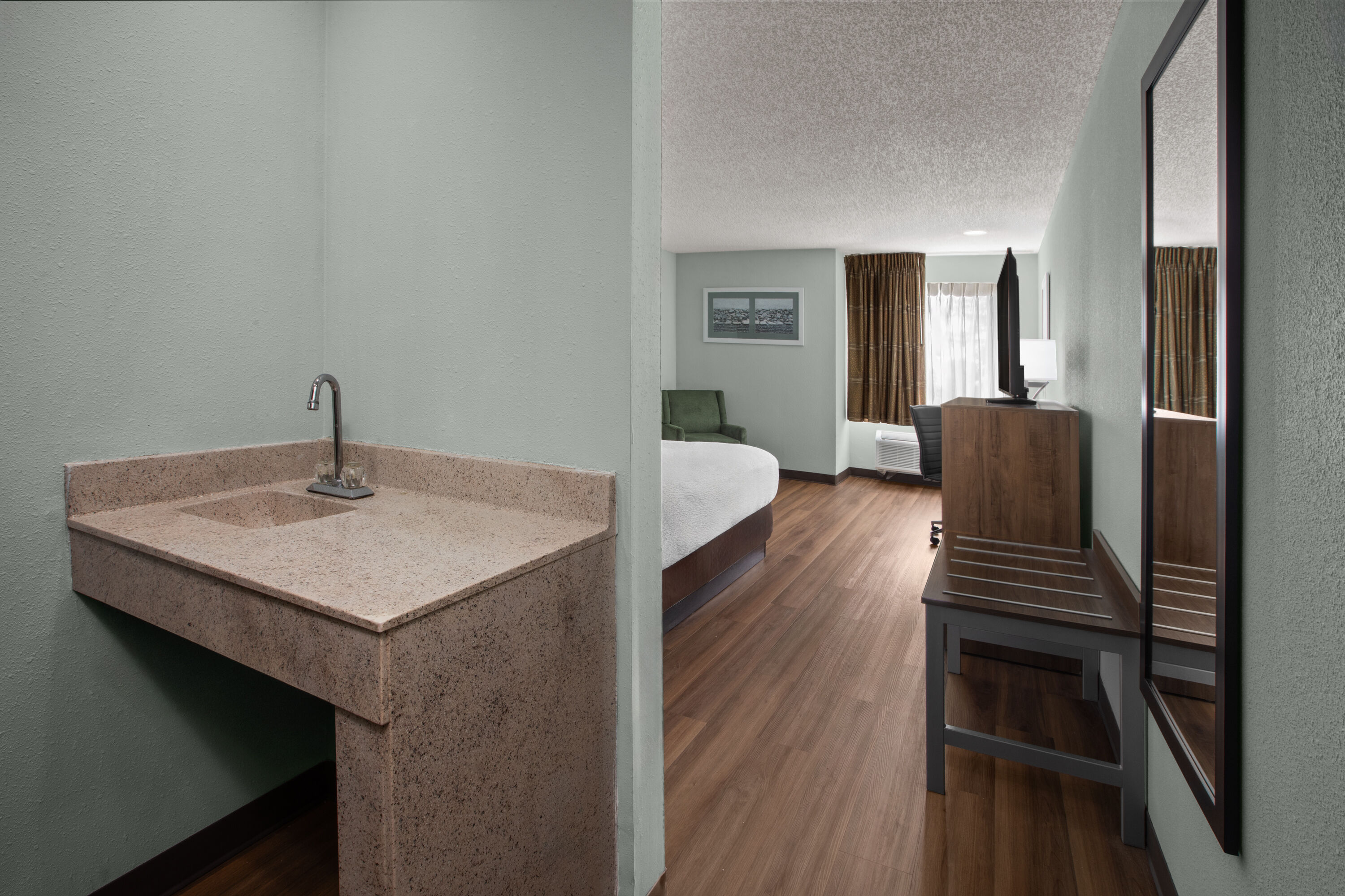Guest room at the Wingate by Wyndham Livonia in Livonia, Michigan