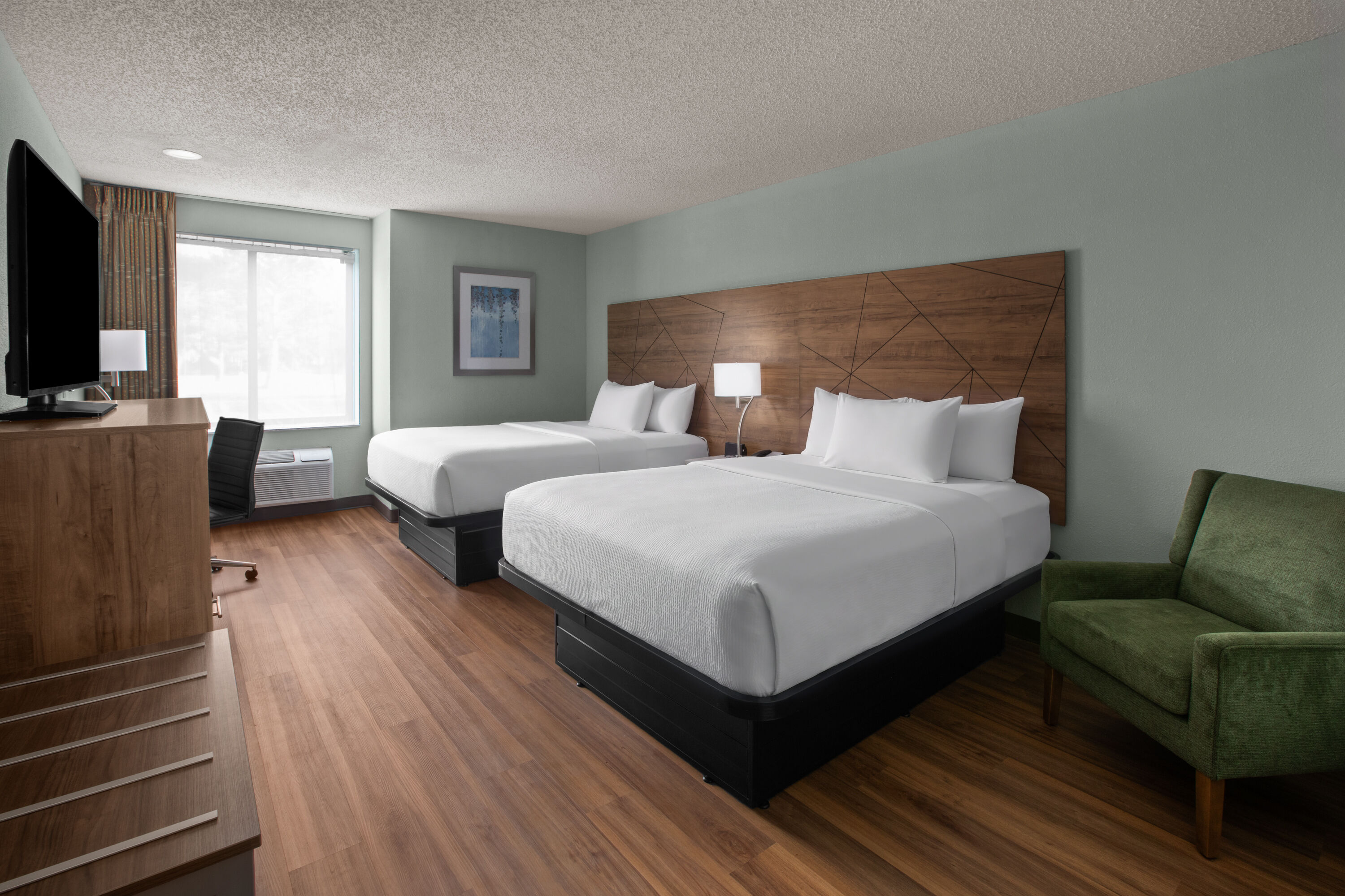 Guest room at the Wingate by Wyndham Livonia in Livonia, Michigan