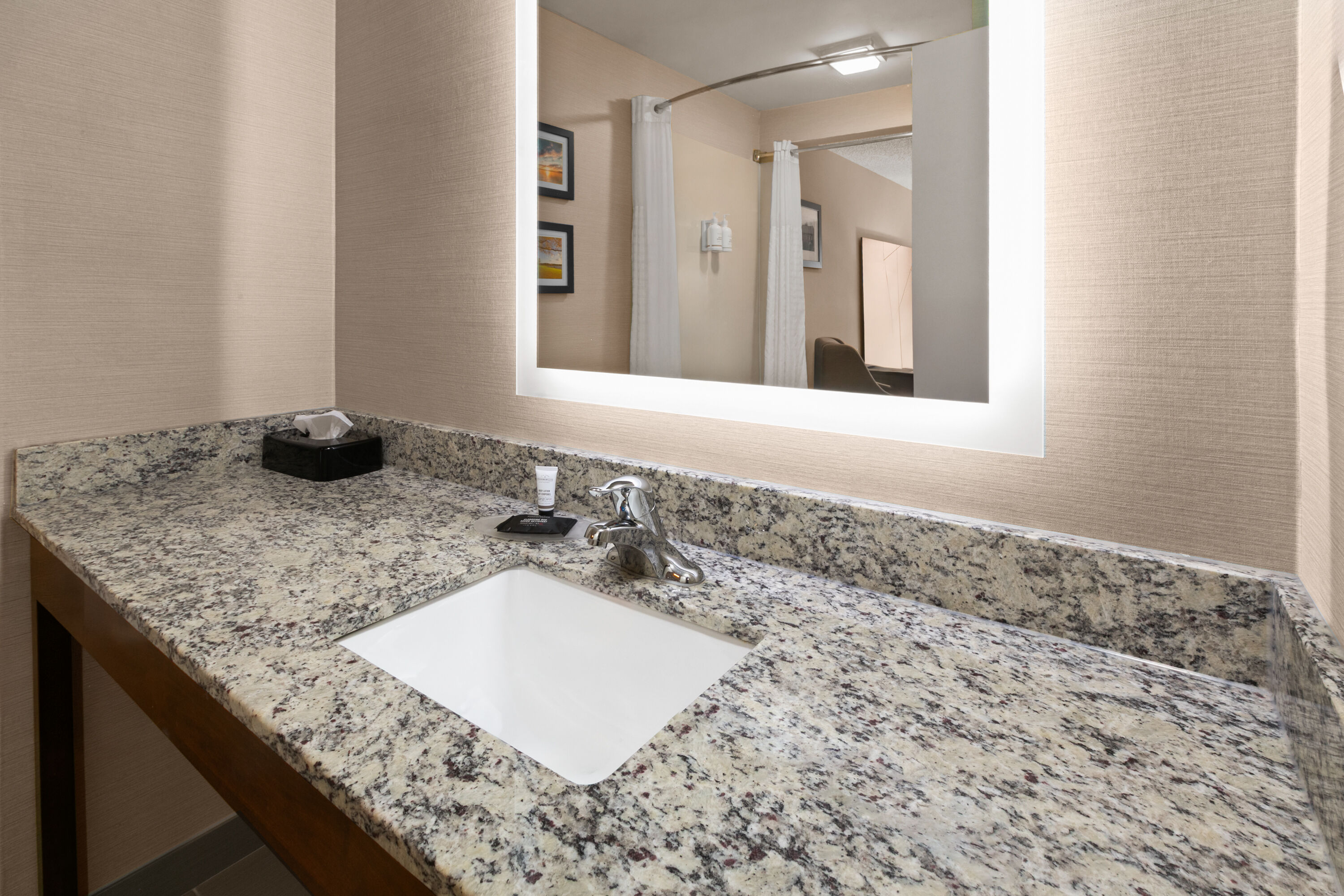Guest room bath at the Wingate by Wyndham Utica in Utica, Michigan