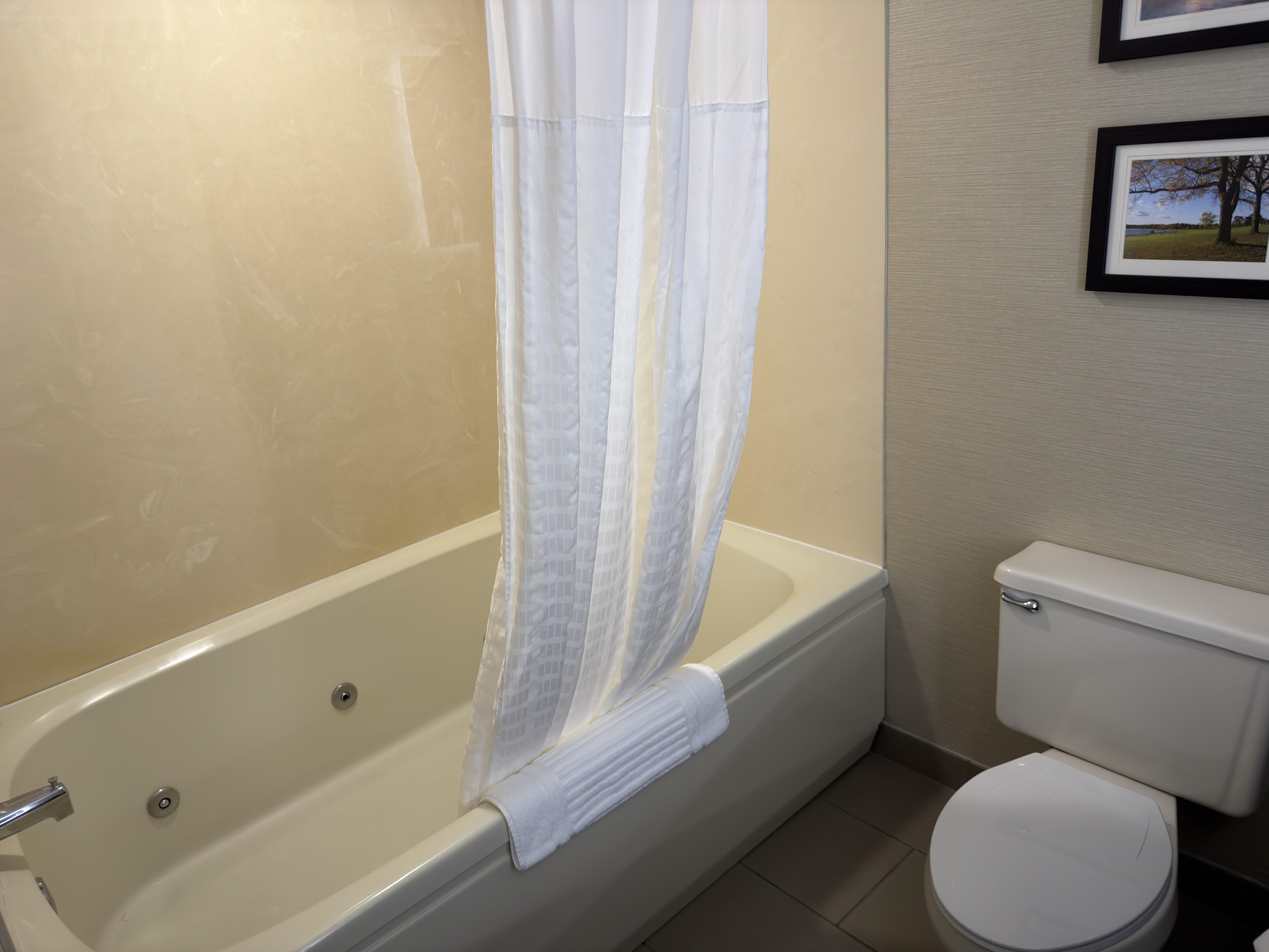 Guest room bath at the Wingate by Wyndham Utica in Utica, Michigan