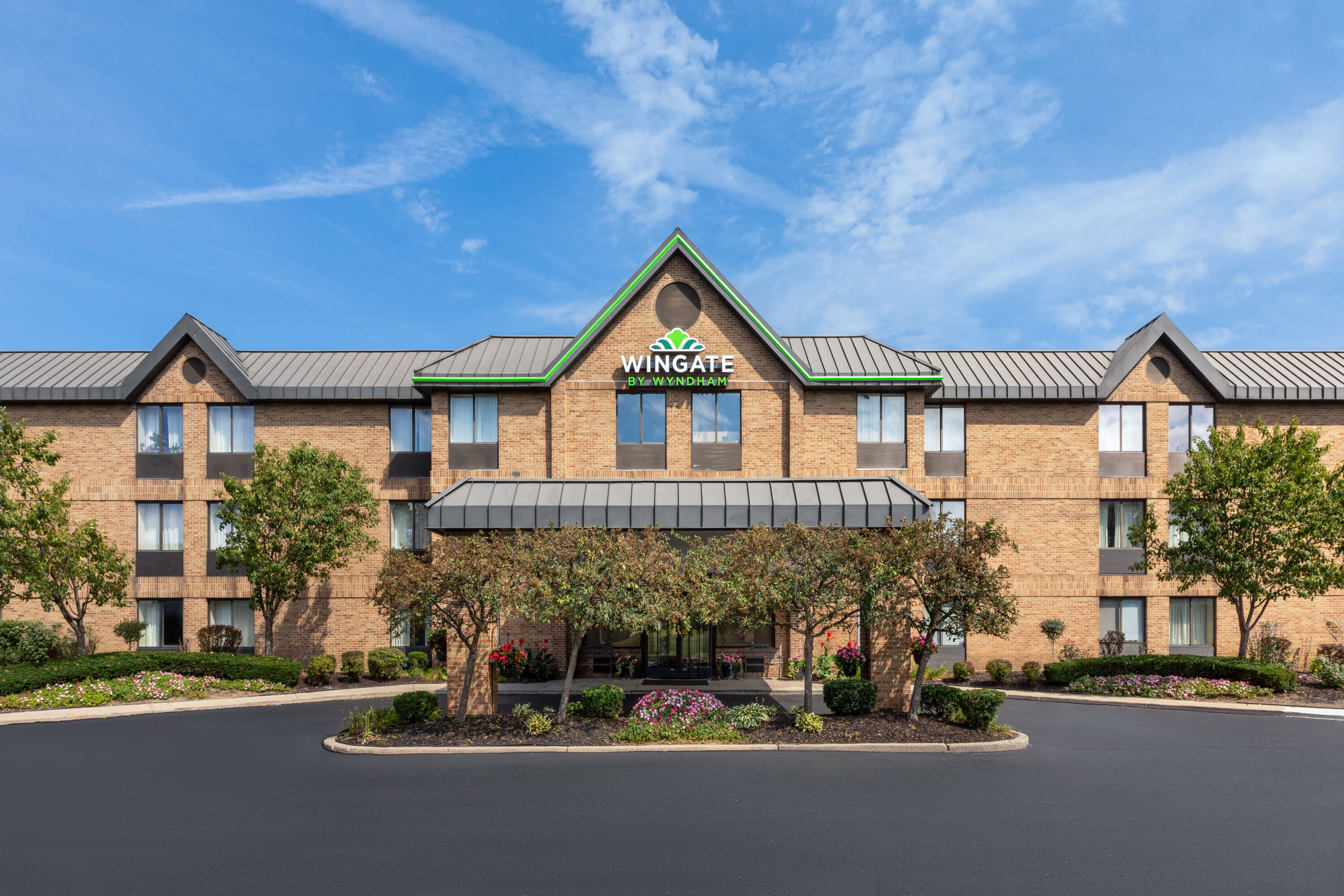 Exterior Day Image of Wingate by Wyndham Utica hotel in Utica, Michigan