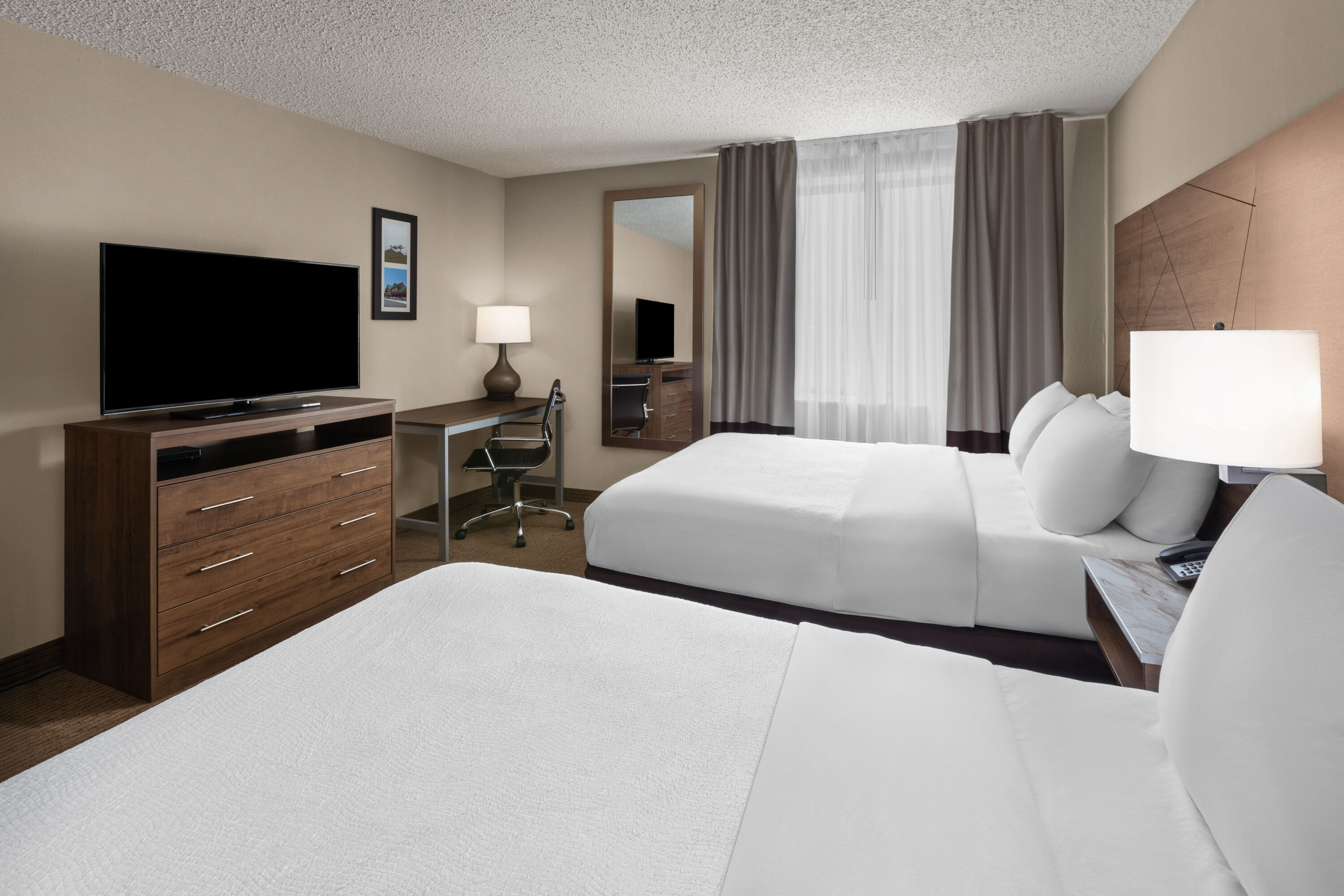 Guest room at the Wingate by Wyndham Utica in Utica, Michigan