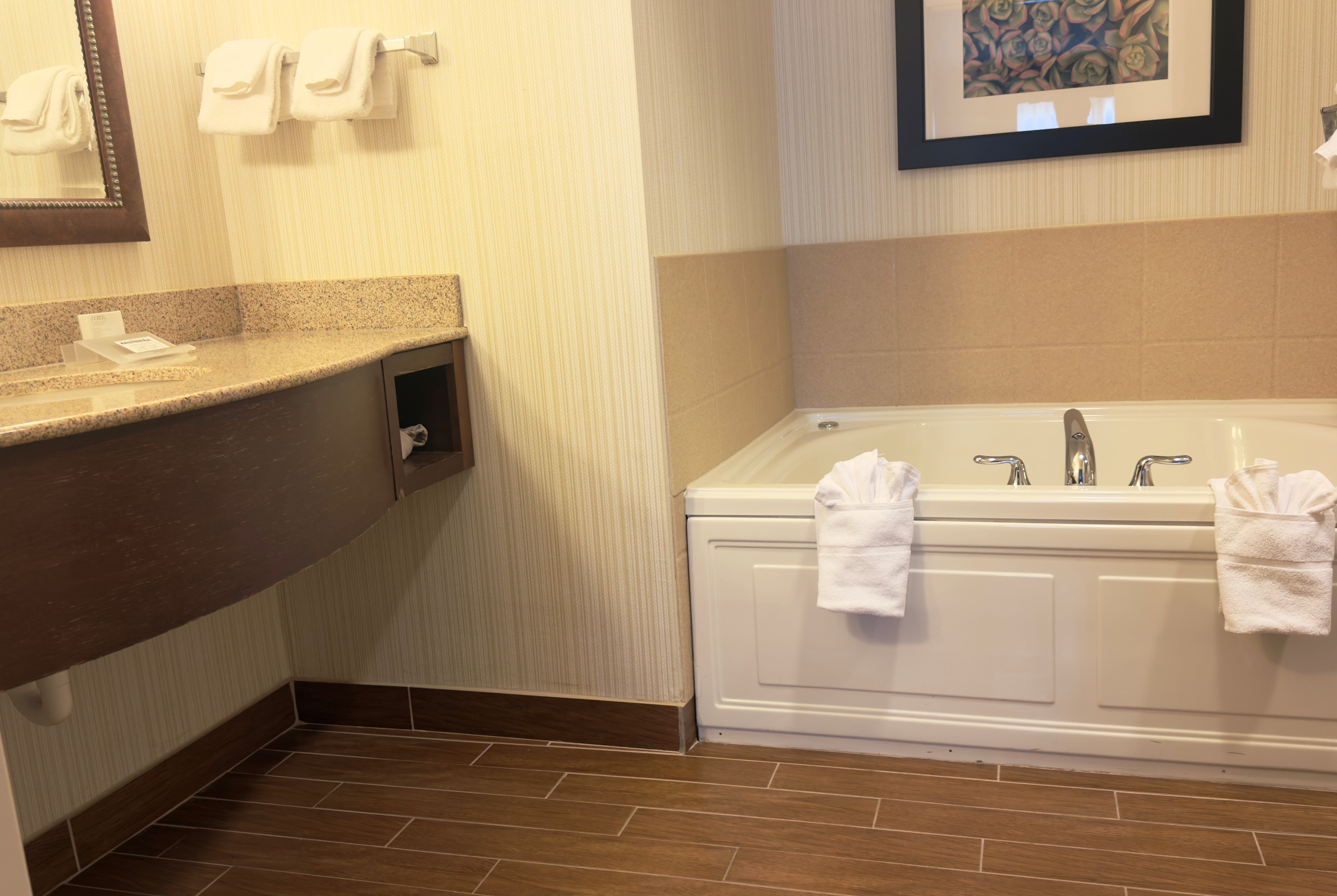 Guest room bath at the Wingate by Wyndham St. Paul/Oakdale/Woodbury in Oakdale, Minnesota