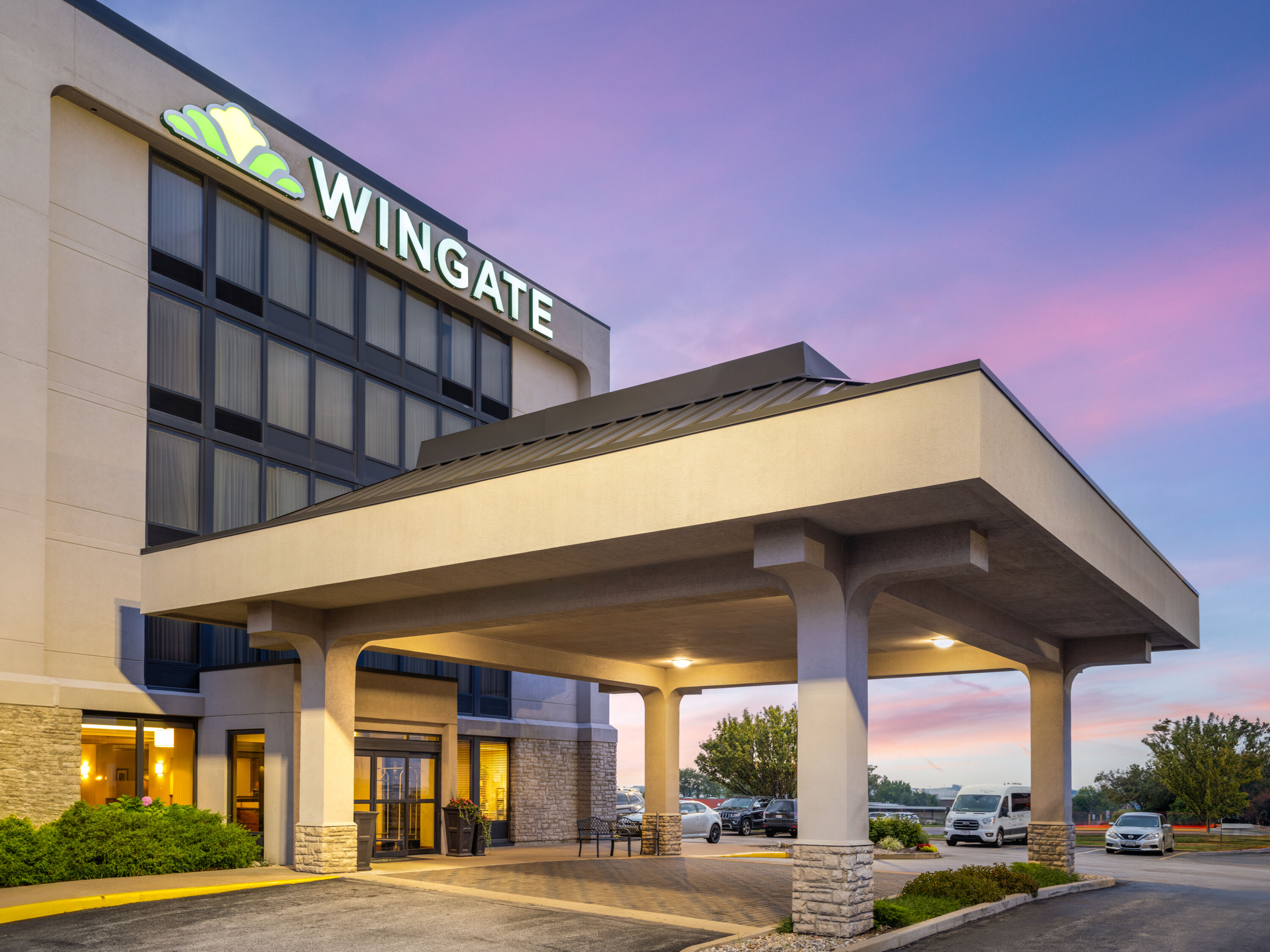 Exterior Dusk Image of Wingate by Wyndham St. Louis Airport hotel in Saint Ann, Missouri