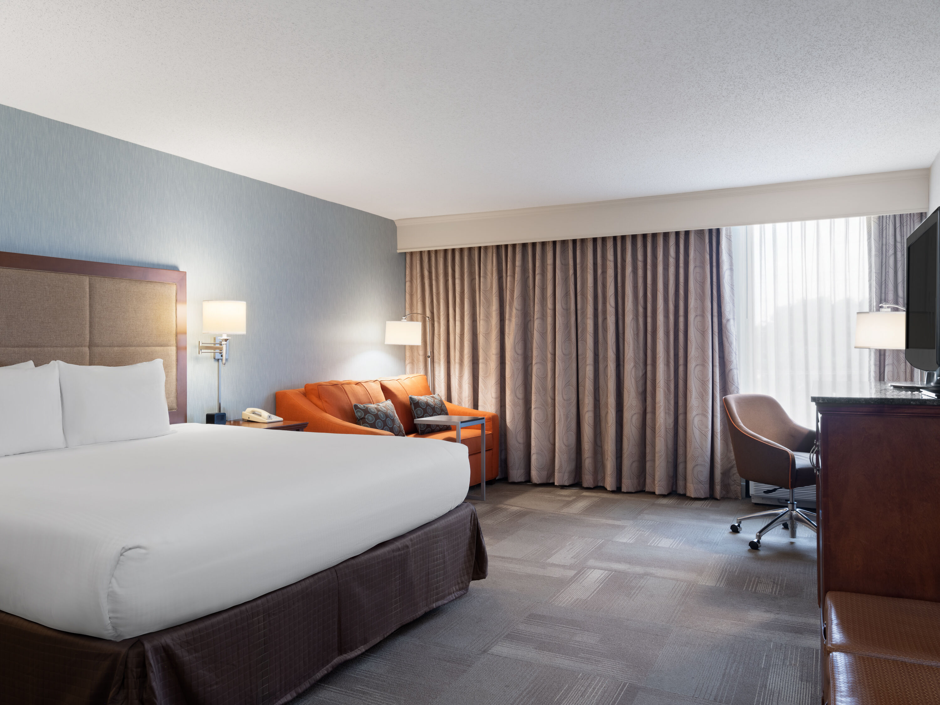 Guest room at the Wingate by Wyndham St. Louis Airport in Saint Ann, Missouri
