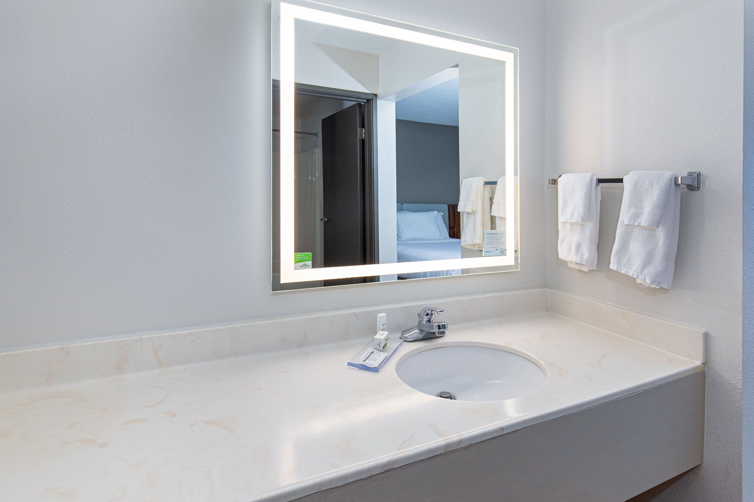 Guest room bath at the Wingate by Wyndham Hattiesburg in Hattiesburg, Mississippi