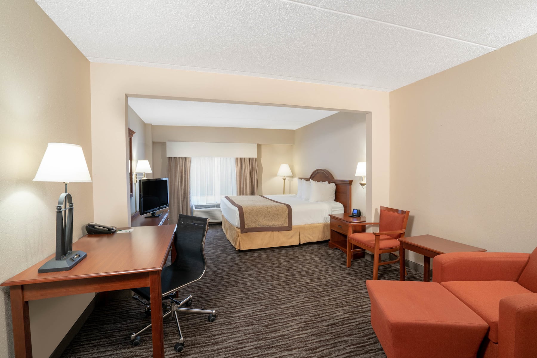 Guest room at the Wingate By Wyndham Charlotte Airport I-85/I-485 in Charlotte, North Carolina