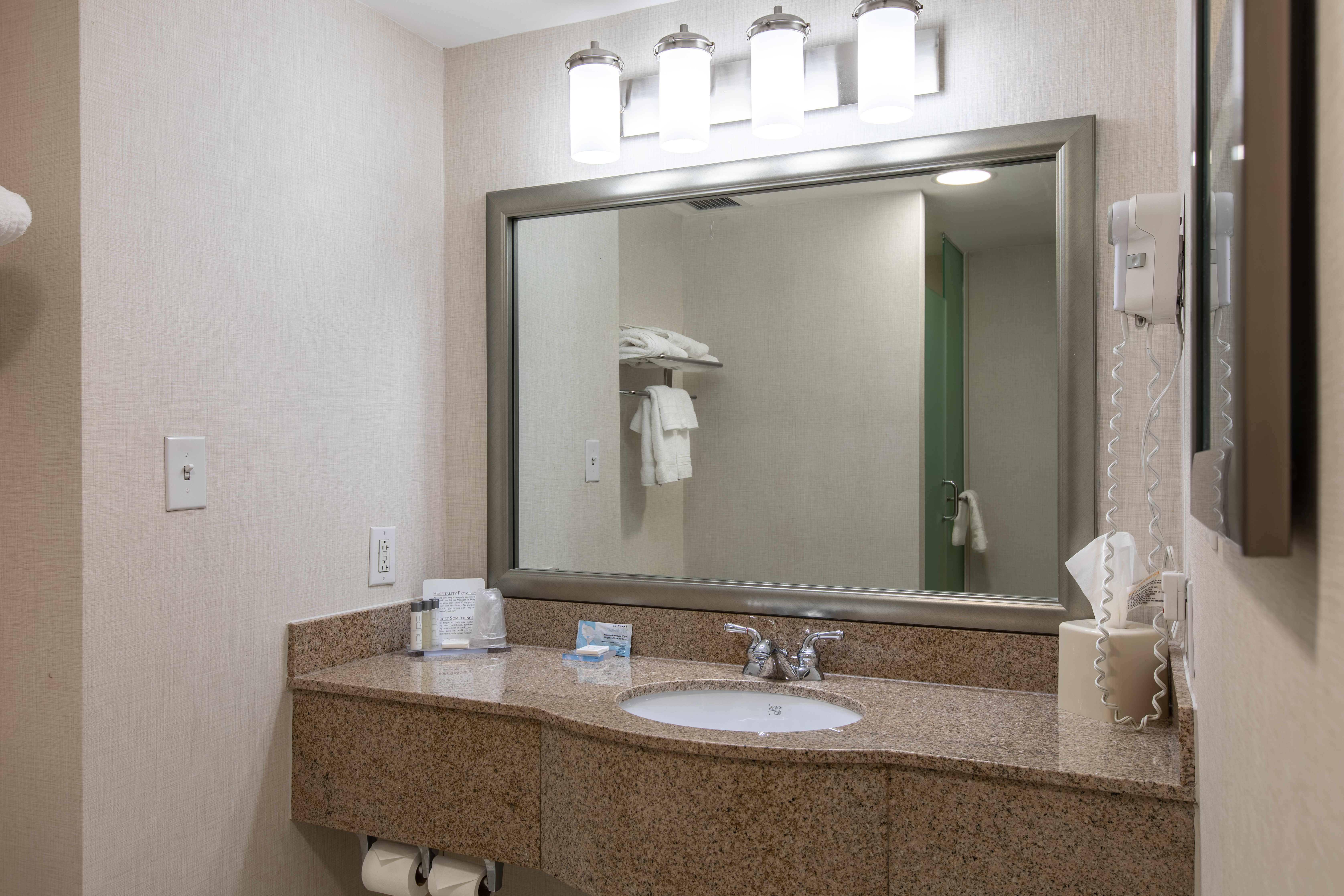 Guest room bath at the Wingate by Wyndham Charlotte Speedway/Concord in Concord, North Carolina