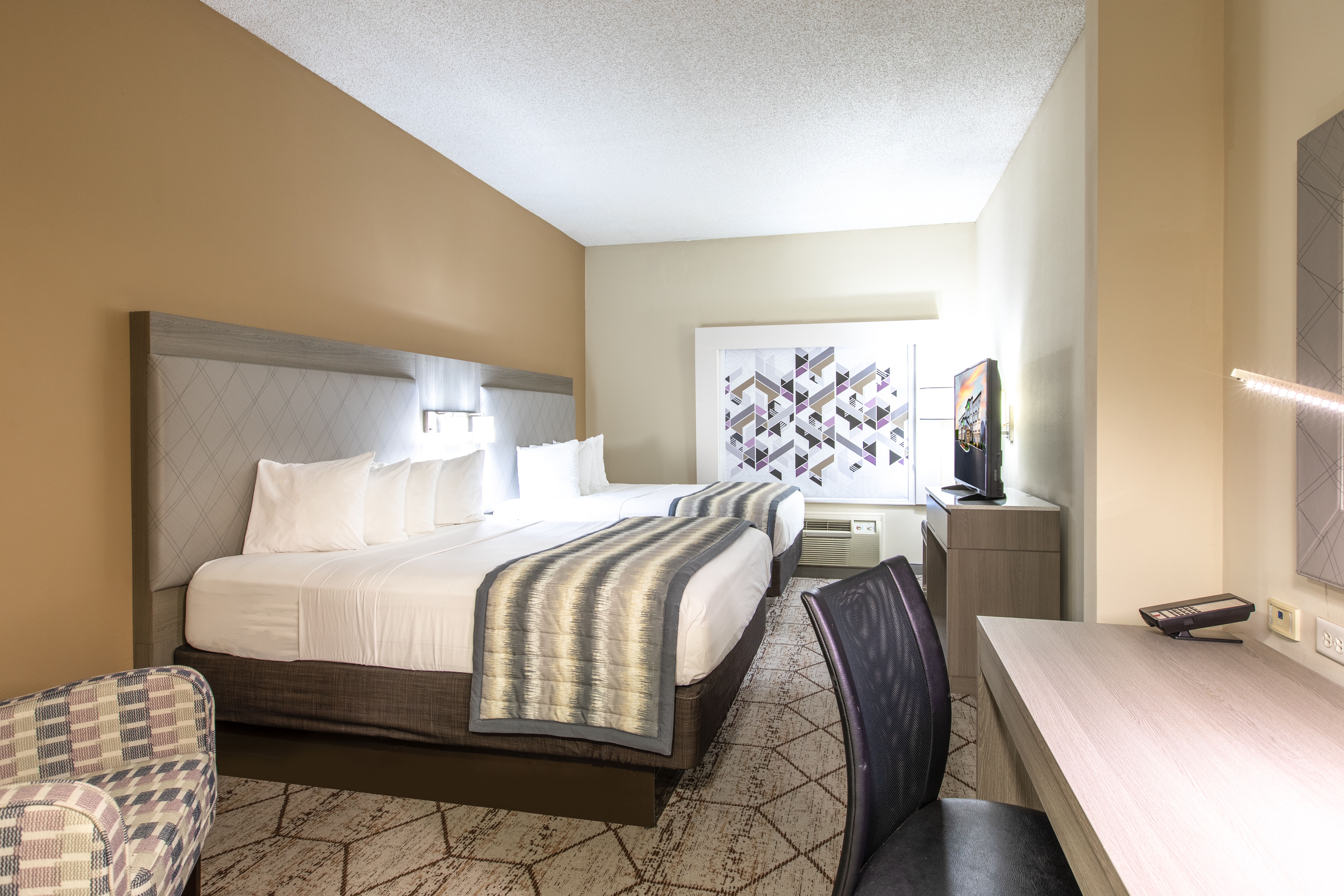 Guest room at the Wingate by Wyndham Charlotte Speedway/Concord in Concord, North Carolina