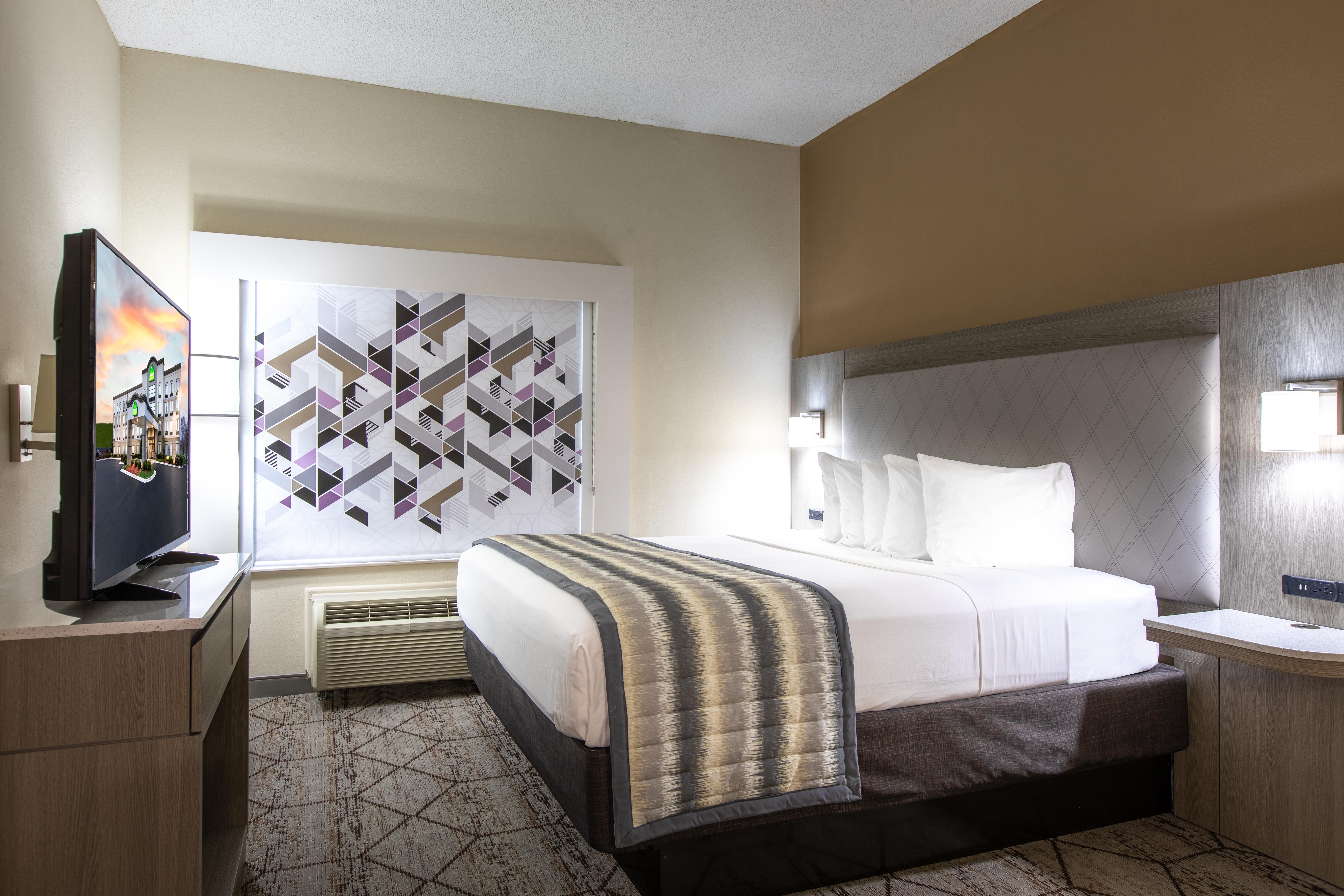 Guest room at the Wingate by Wyndham Charlotte Speedway/Concord in Concord, North Carolina