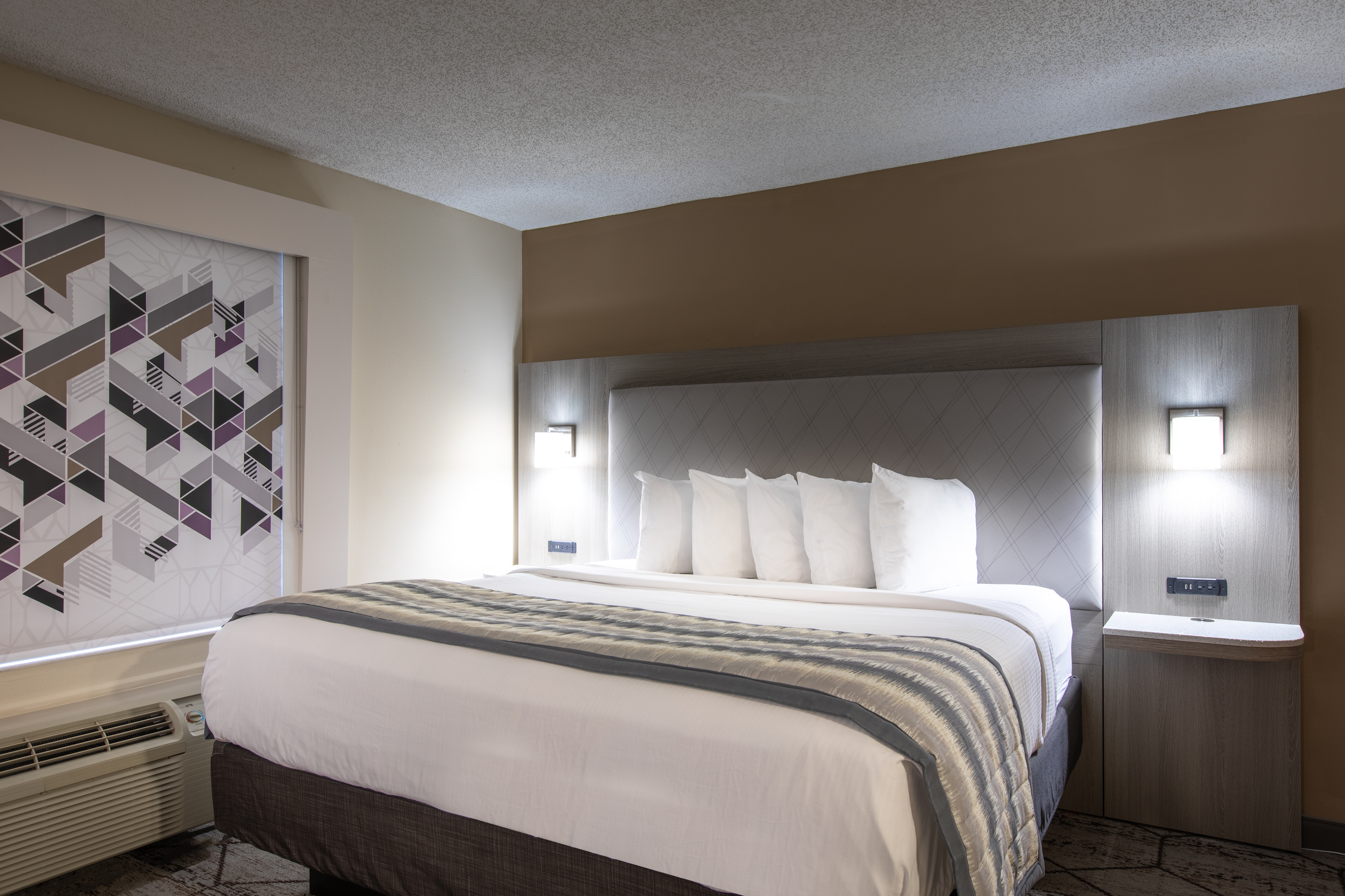 Guest room at the Wingate by Wyndham Charlotte Speedway/Concord in Concord, North Carolina
