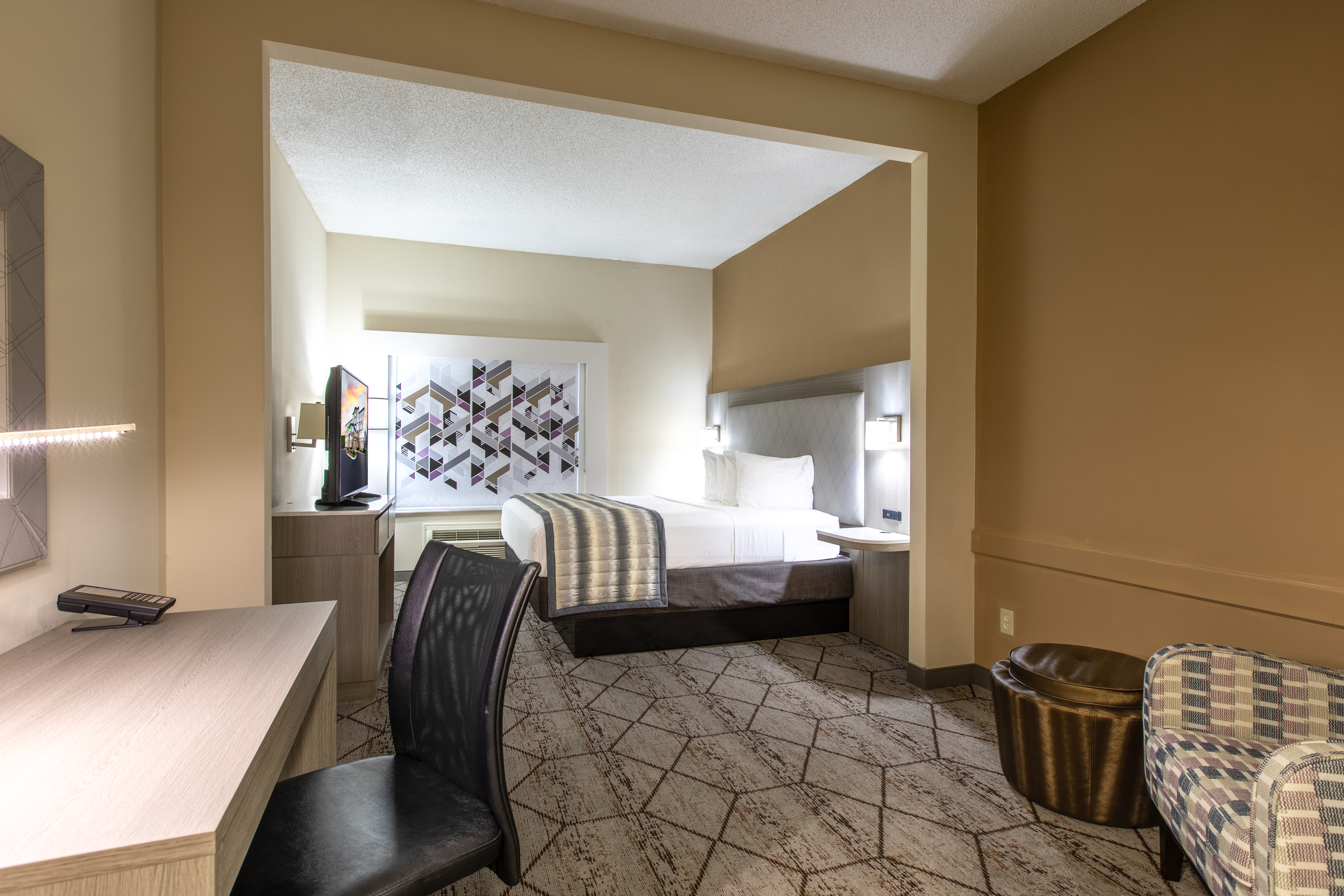 Guest room at the Wingate by Wyndham Charlotte Speedway/Concord in Concord, North Carolina