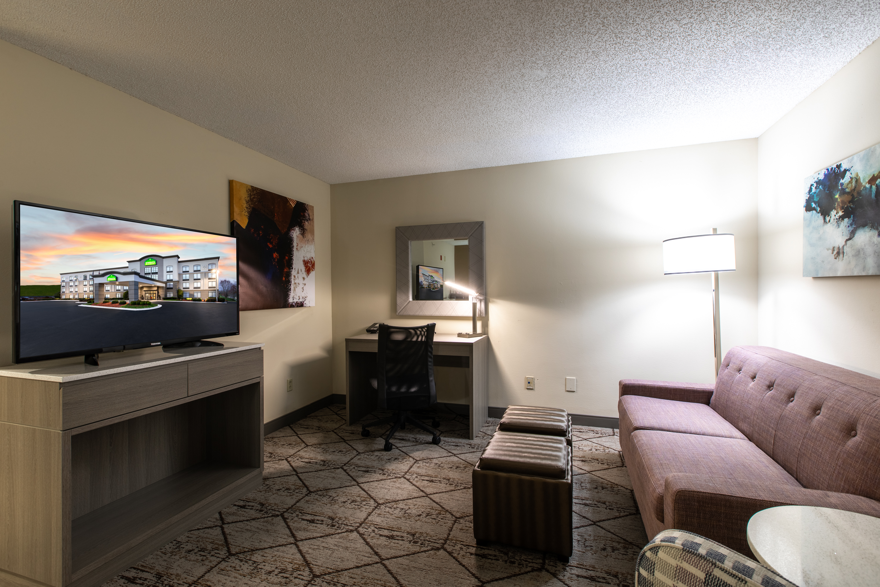 Guest room at the Wingate by Wyndham Charlotte Speedway/Concord in Concord, North Carolina