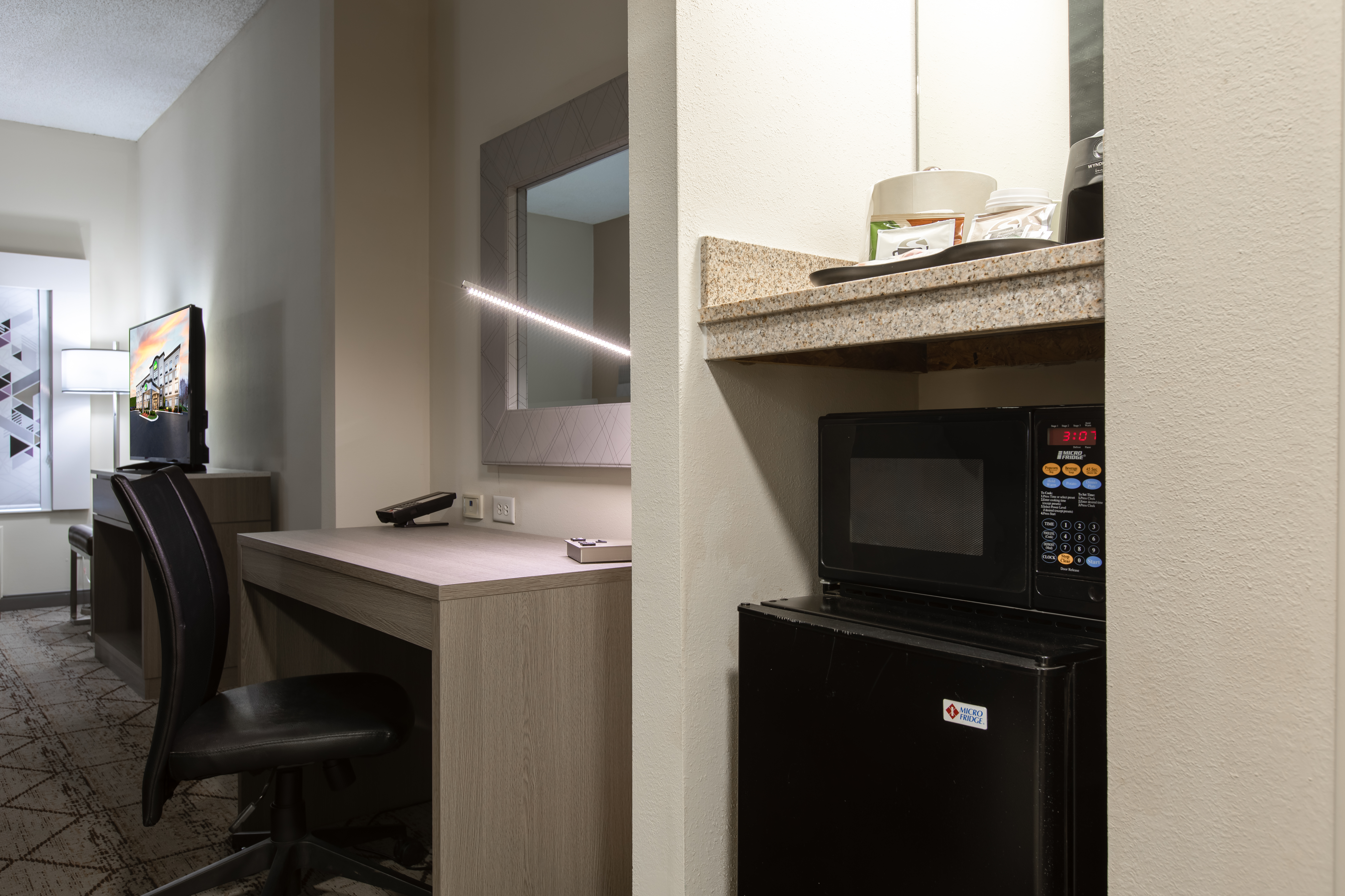 Guest room at the Wingate by Wyndham Charlotte Speedway/Concord in Concord, North Carolina