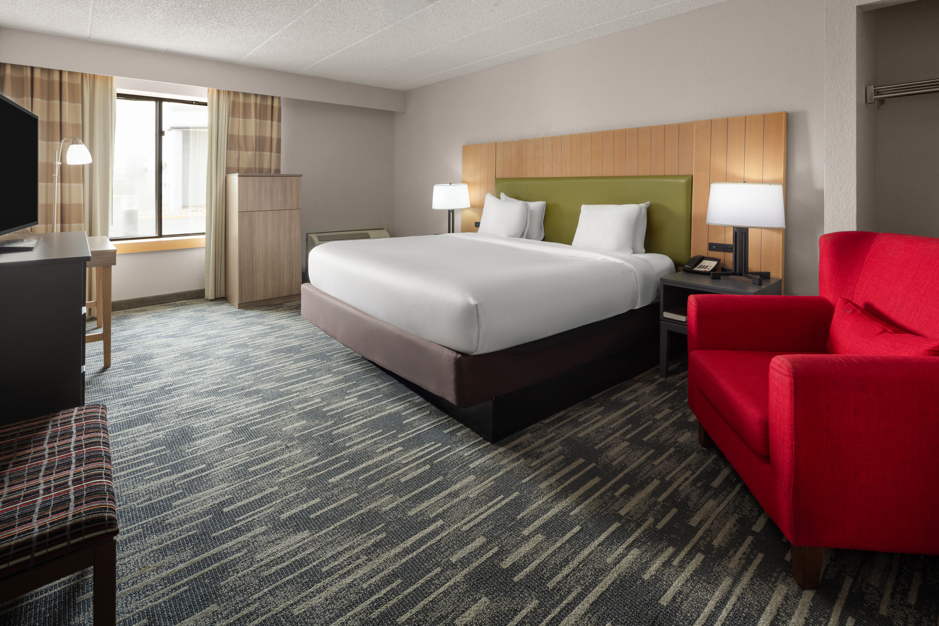 Guest room at the Wingate by Wyndham Lincoln Airport East I-80 in Lincoln, Nebraska