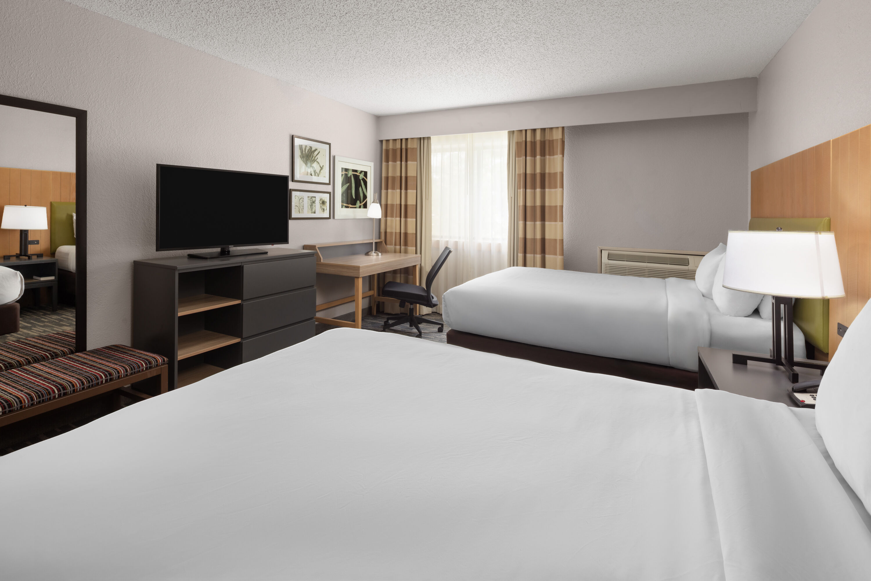Guest room at the Wingate by Wyndham Lincoln Airport East I-80 in Lincoln, Nebraska