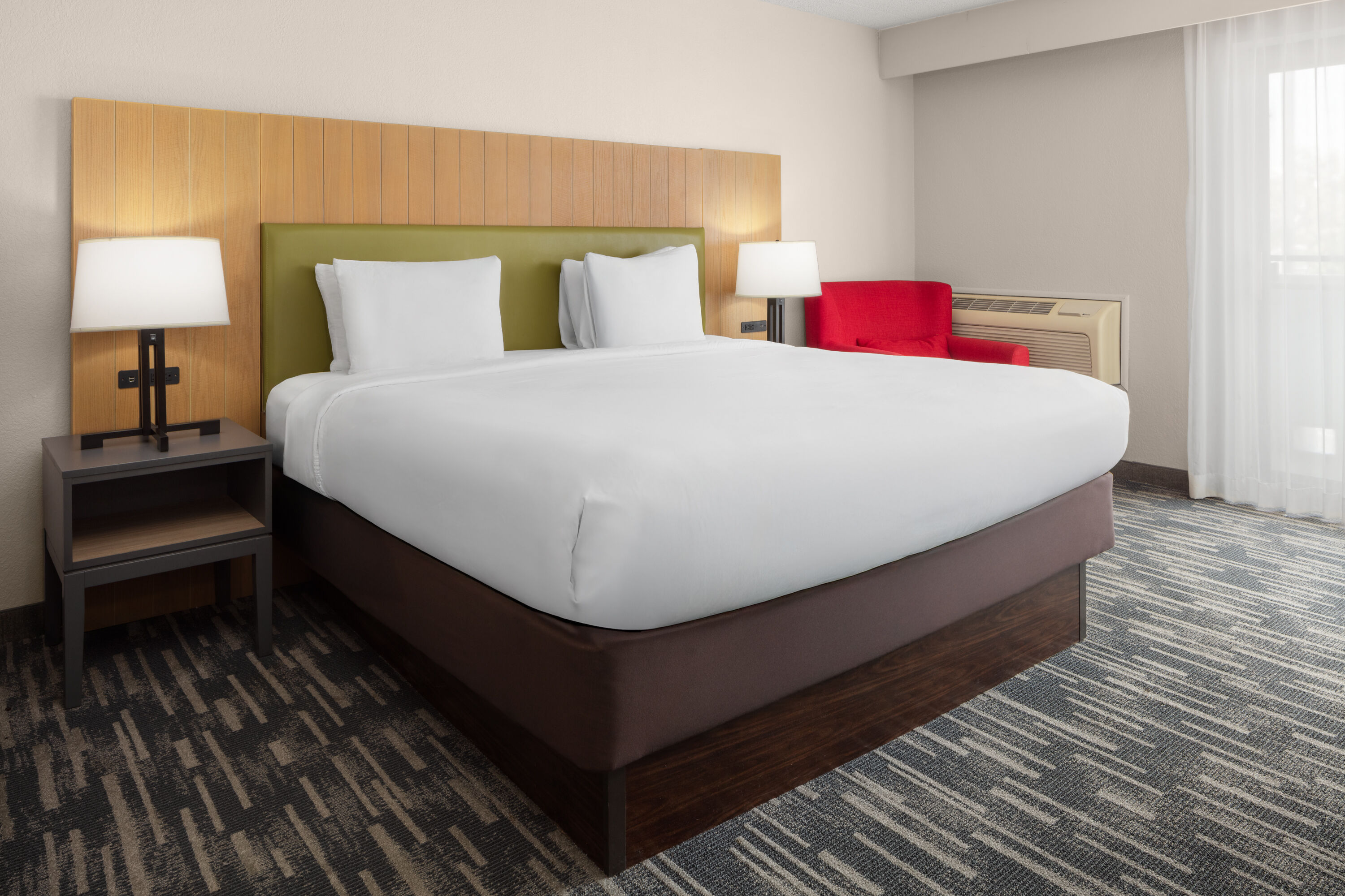 Guest room at the Wingate by Wyndham Lincoln Airport East I-80 in Lincoln, Nebraska