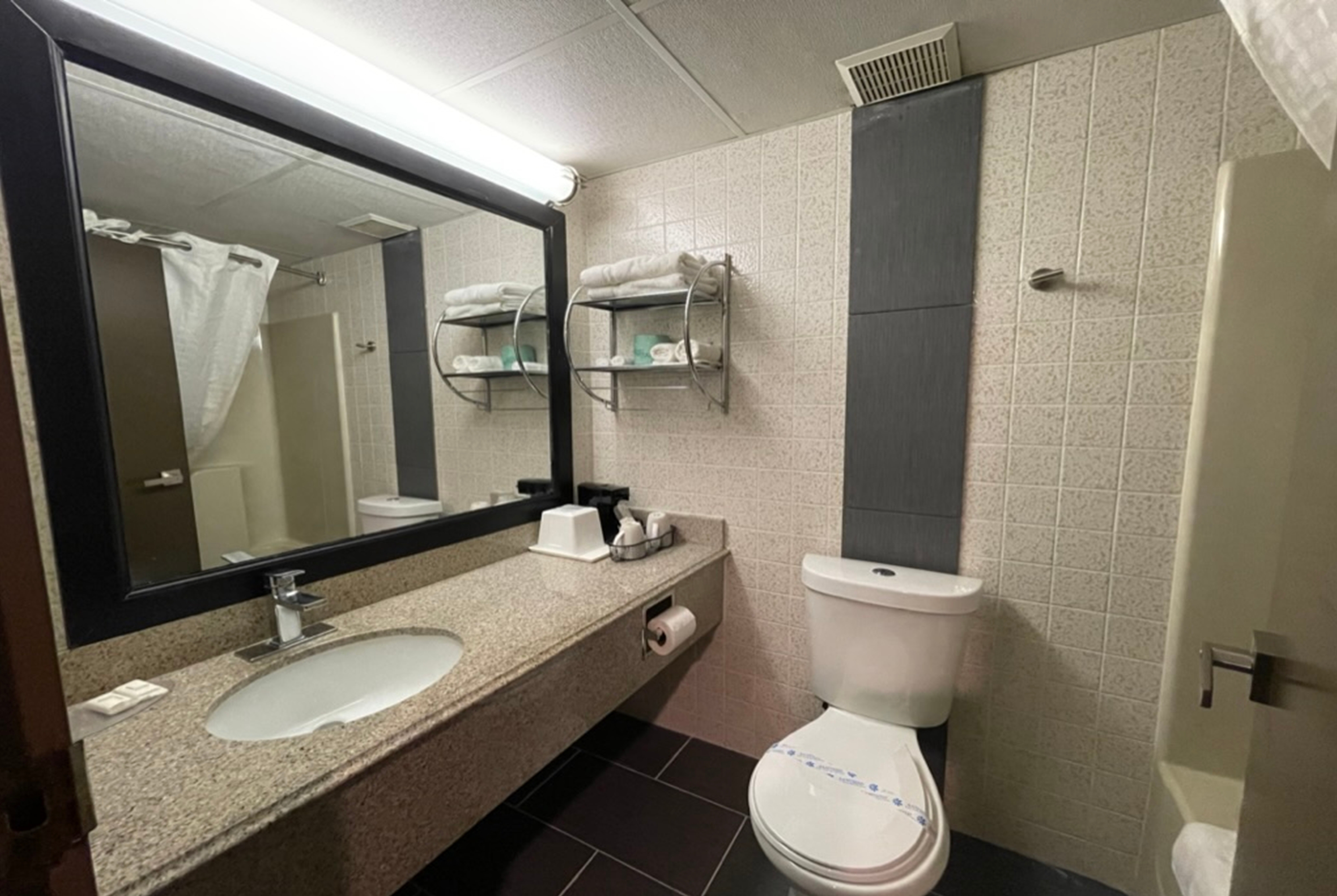 Guest room bath at the Wingate by Wyndham Lake George in Lake George, New York