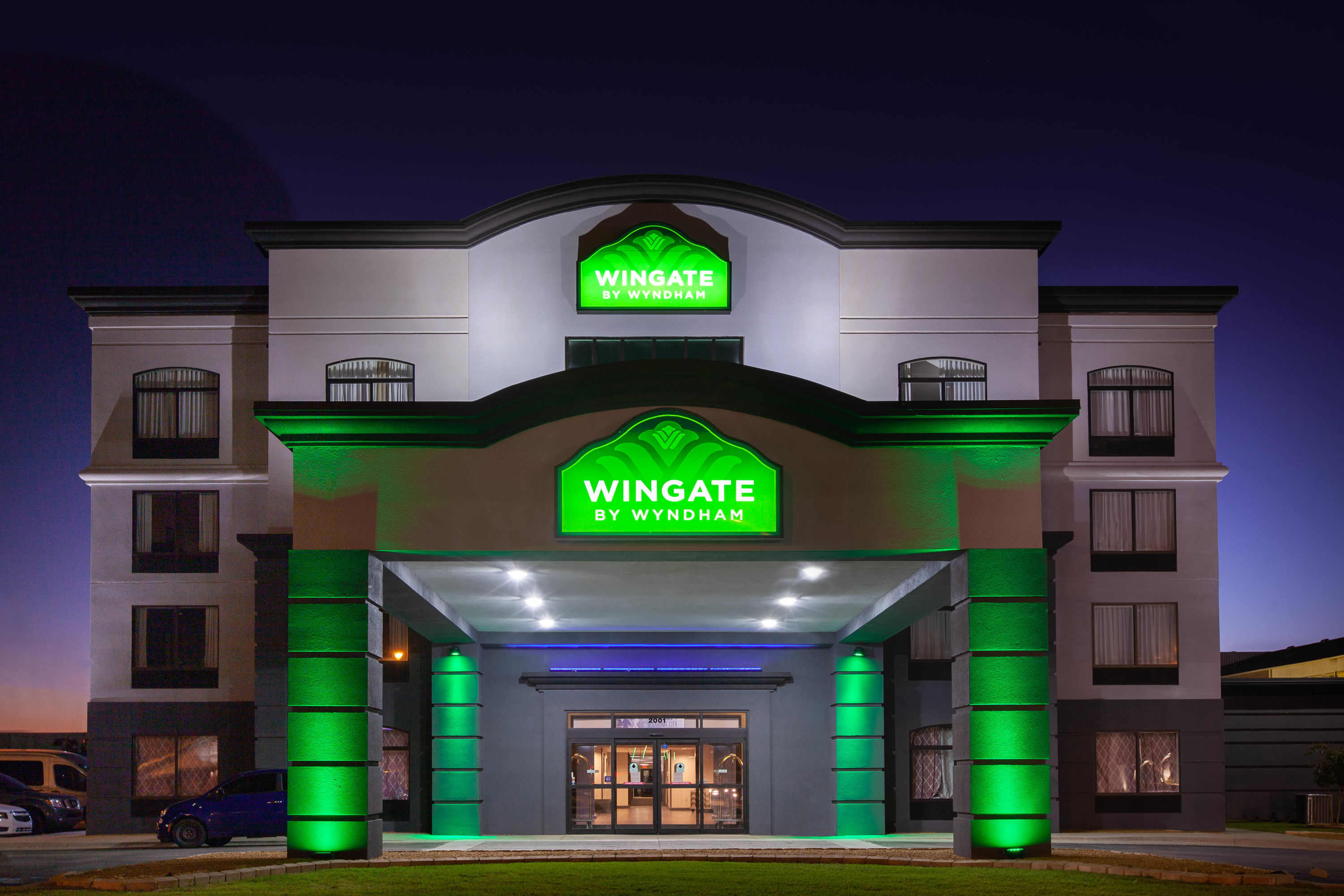 Exterior Night Image of Wingate by Wyndham Oklahoma City Airport hotel in Oklahoma City, Oklahoma