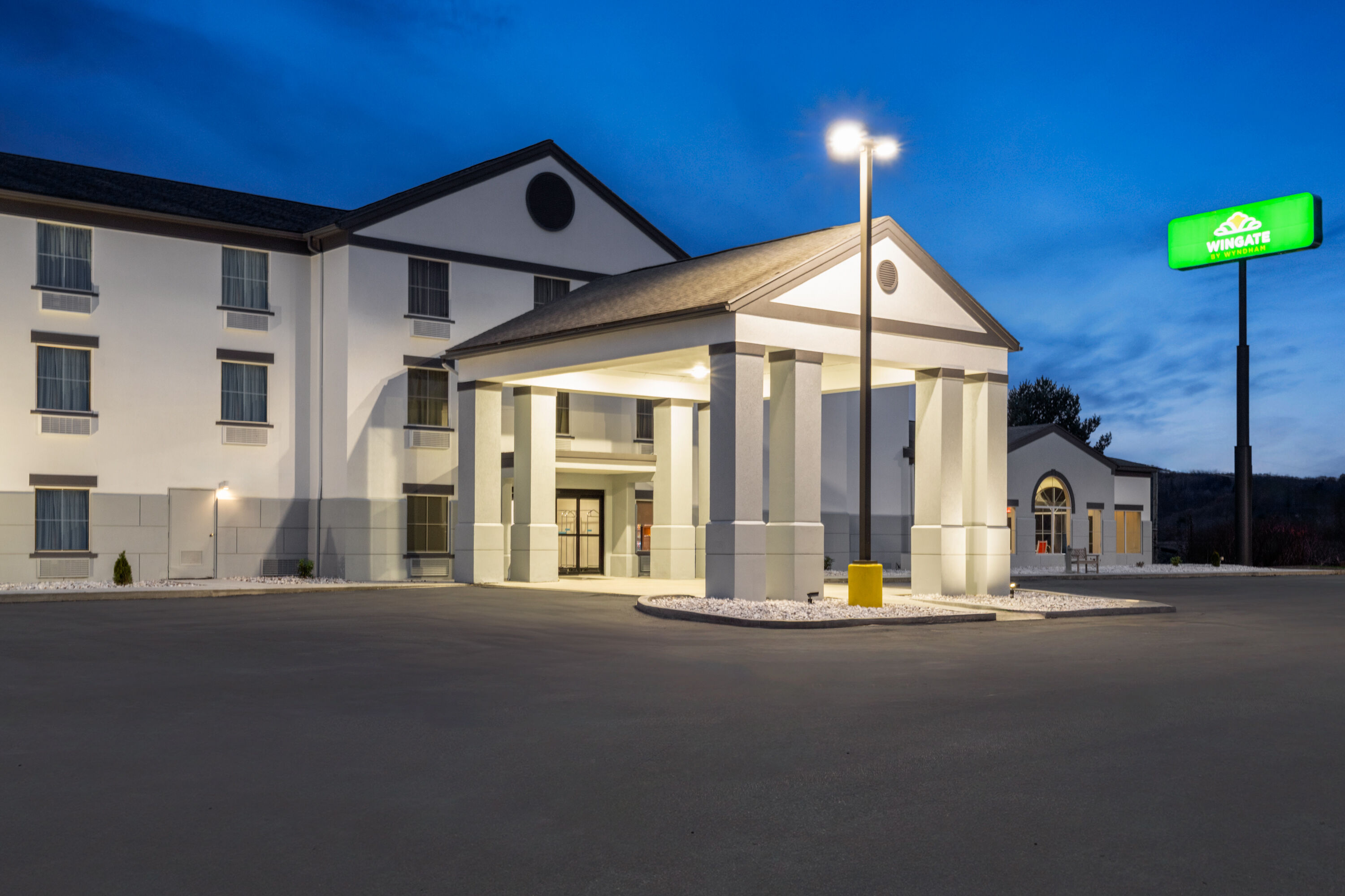 Exterior Dusk Image of Wingate by Wyndham Clearfield hotel in Clearfield, Pennsylvania