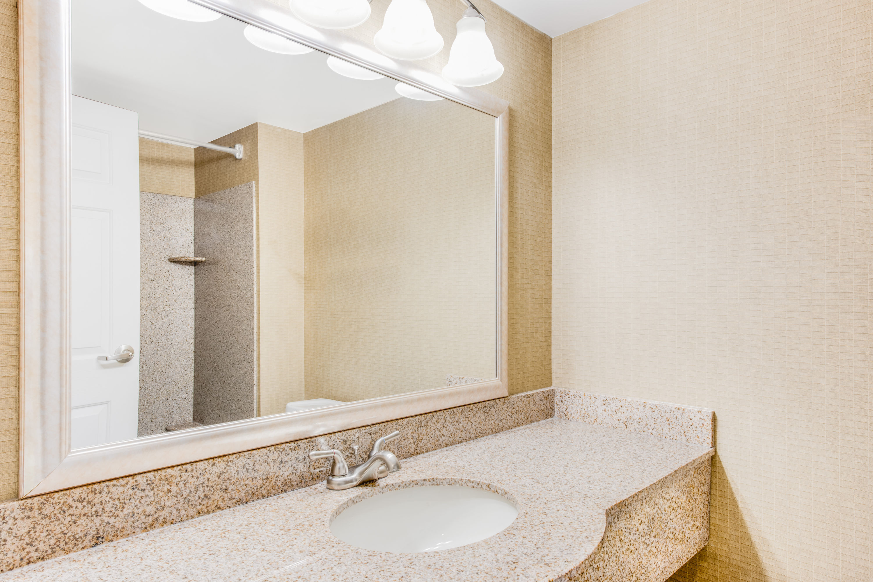 Guest room bath at the Wingate by Wyndham York in York, Pennsylvania