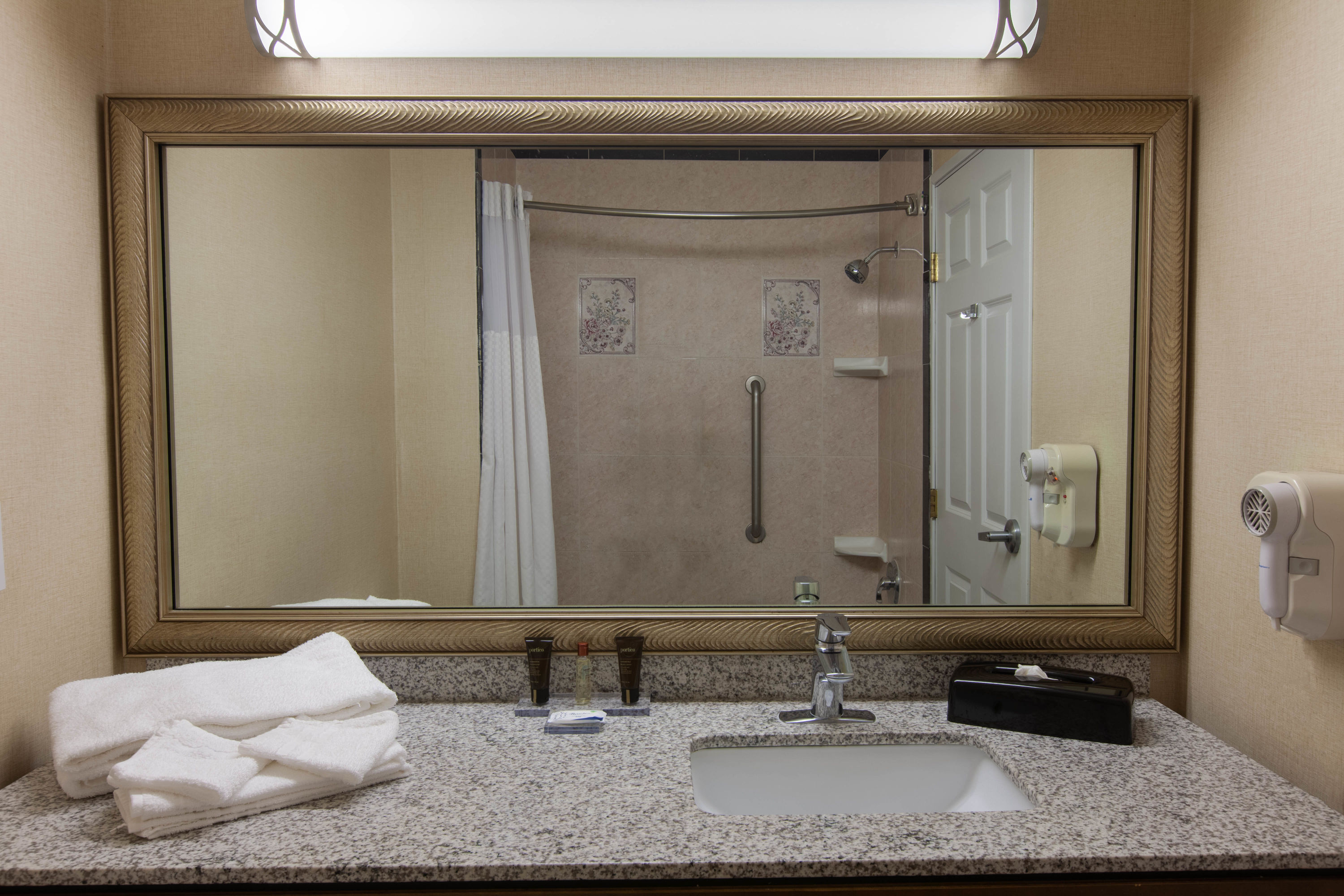Guest room bath at the Wingate by Wyndham Houston / Willowbrook in Houston, Texas