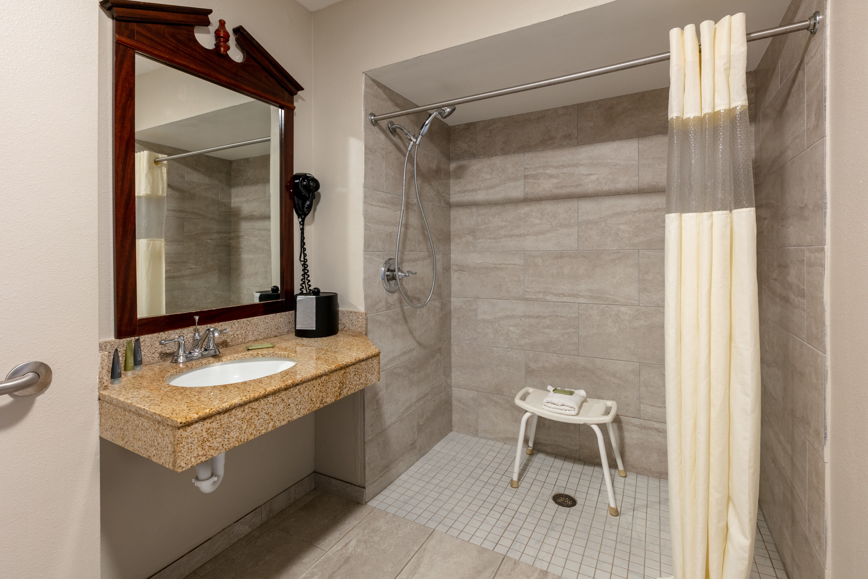 Guest room bath at the Wingate by Wyndham DFW / North Irving in Irving, Texas