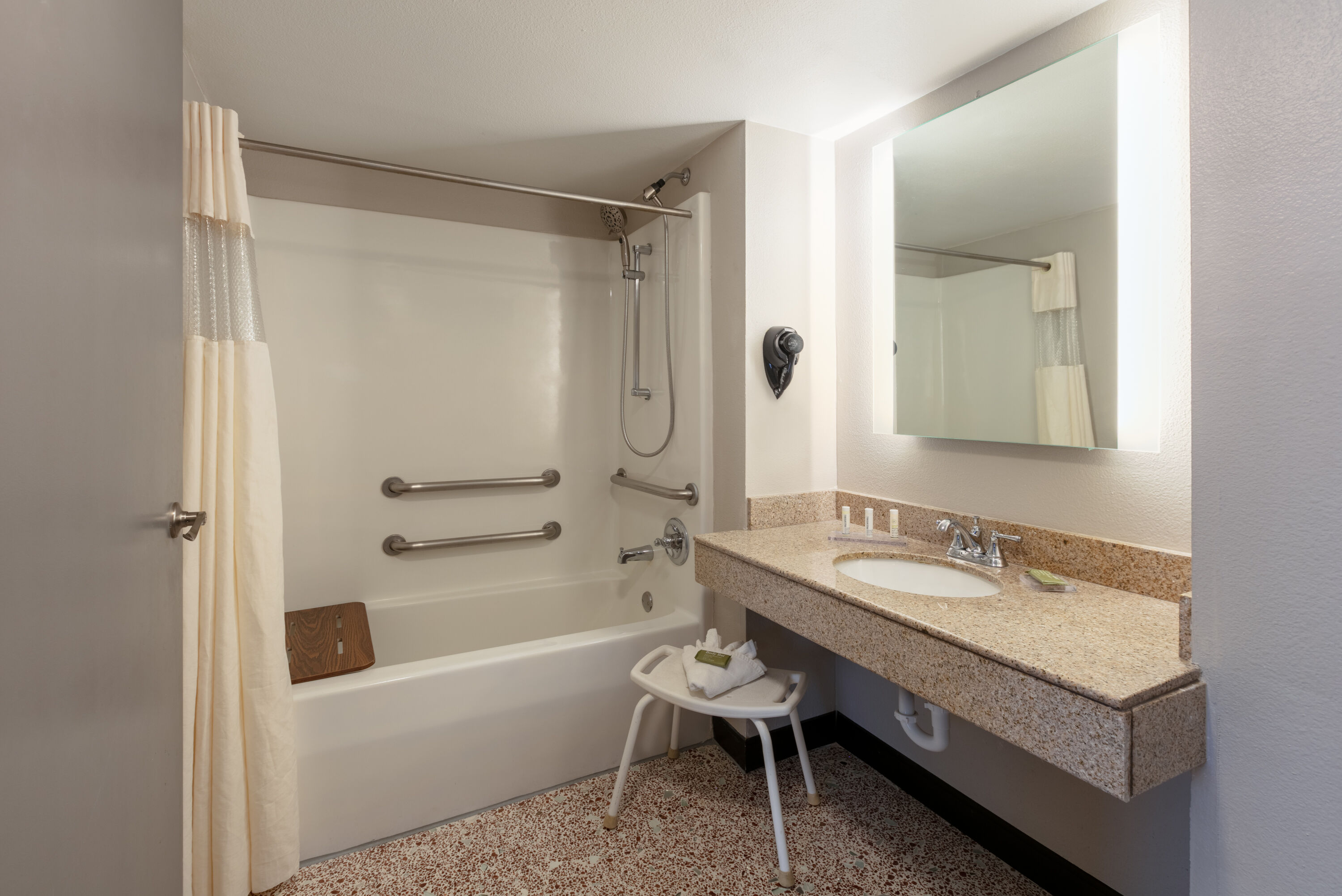 Guest room bath at the Wingate by Wyndham DFW / North Irving in Irving, Texas