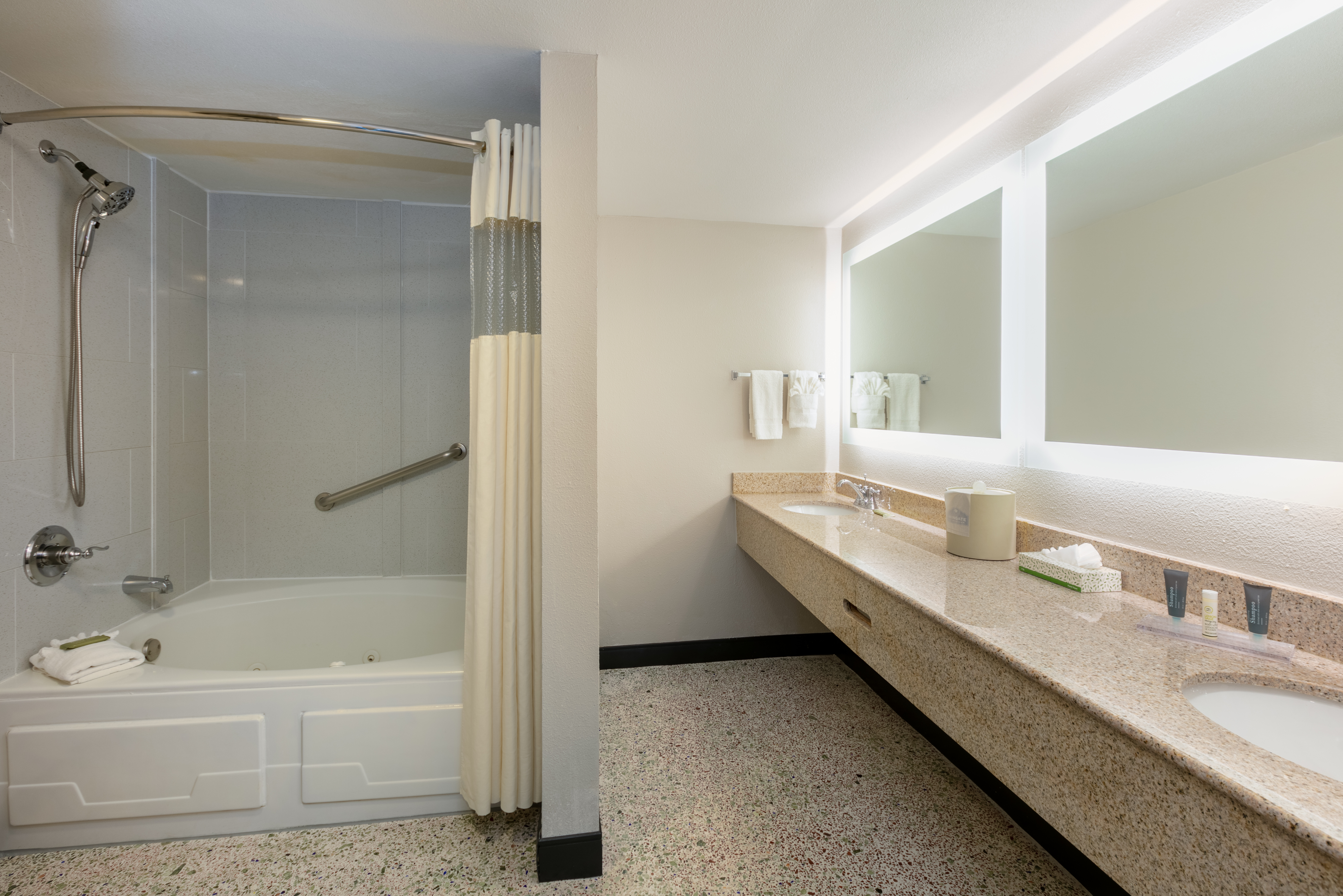 Guest room bath at the Wingate by Wyndham DFW / North Irving in Irving, Texas