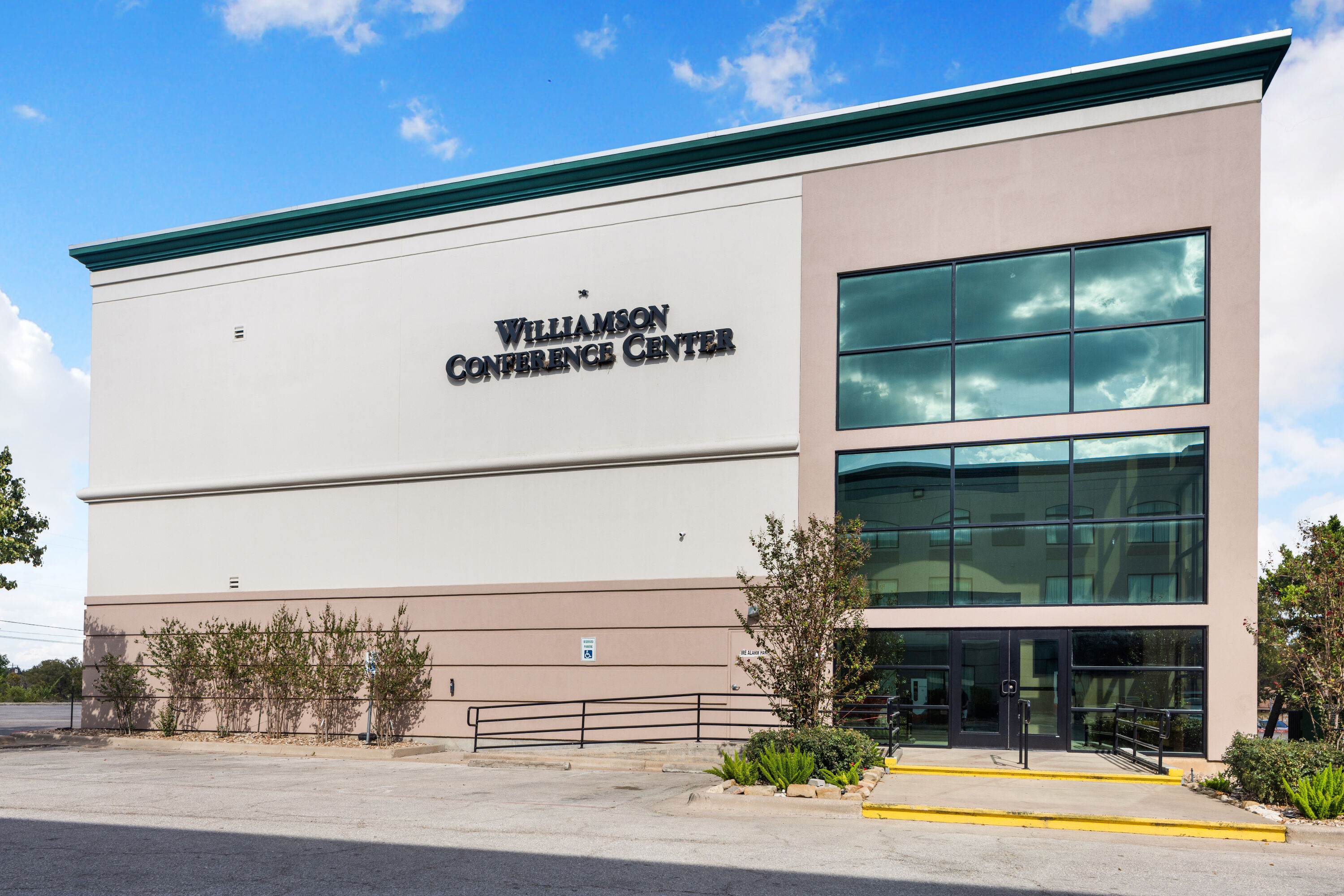 Exterior Day Image of Wingate by Wyndham Round Rock Hotel & Conference Center hotel in Round Rock, Texas