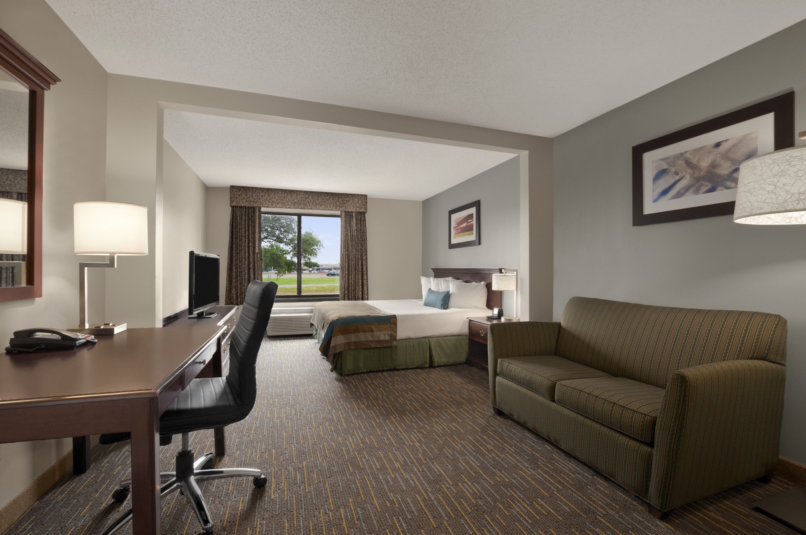 Guest room at the Wingate by Wyndham Round Rock Hotel & Conference Center in Round Rock, Texas