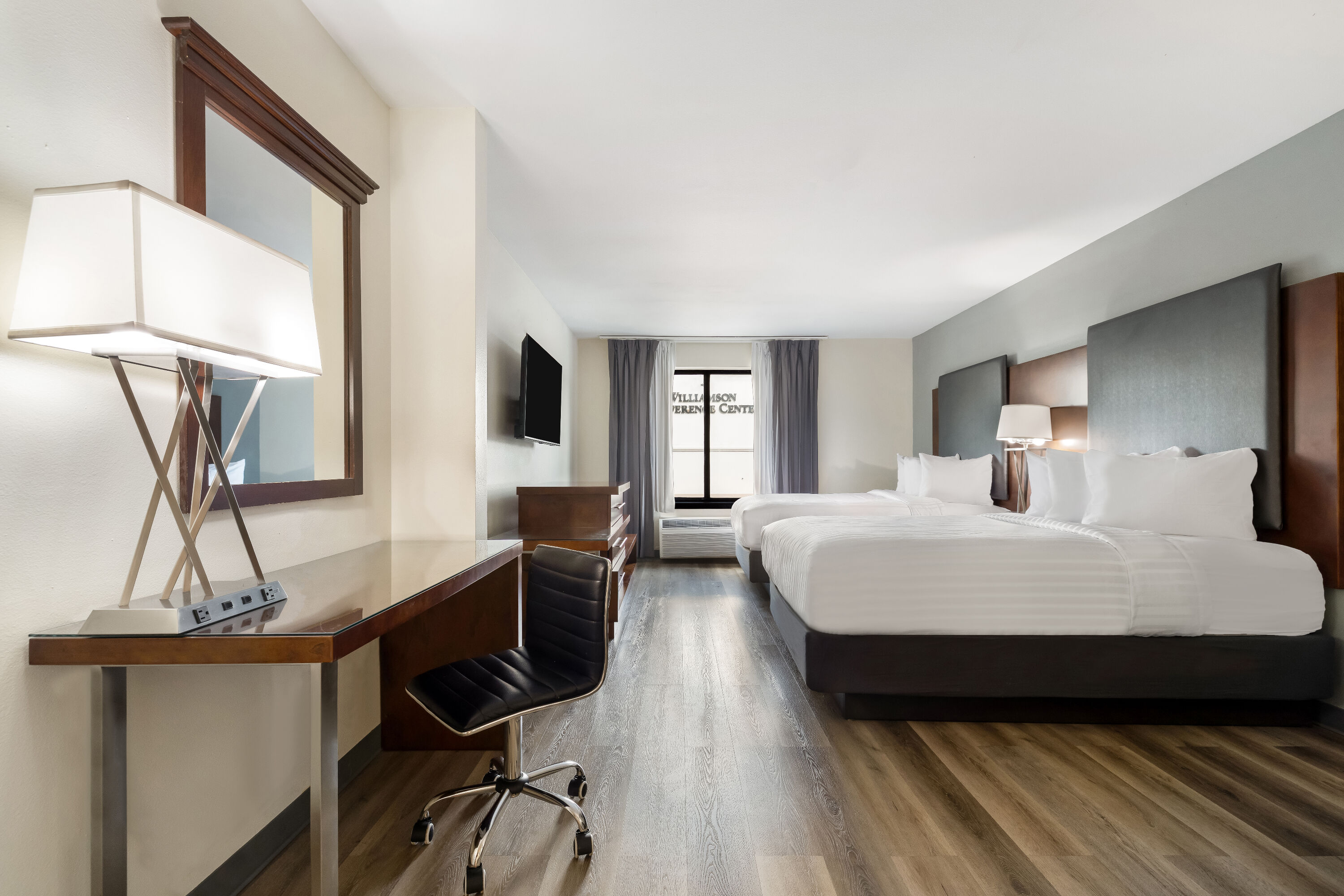 Double bed guest room at the Wingate by Wyndham Round Rock Hotel & Conference Center in Round Rock, Texas