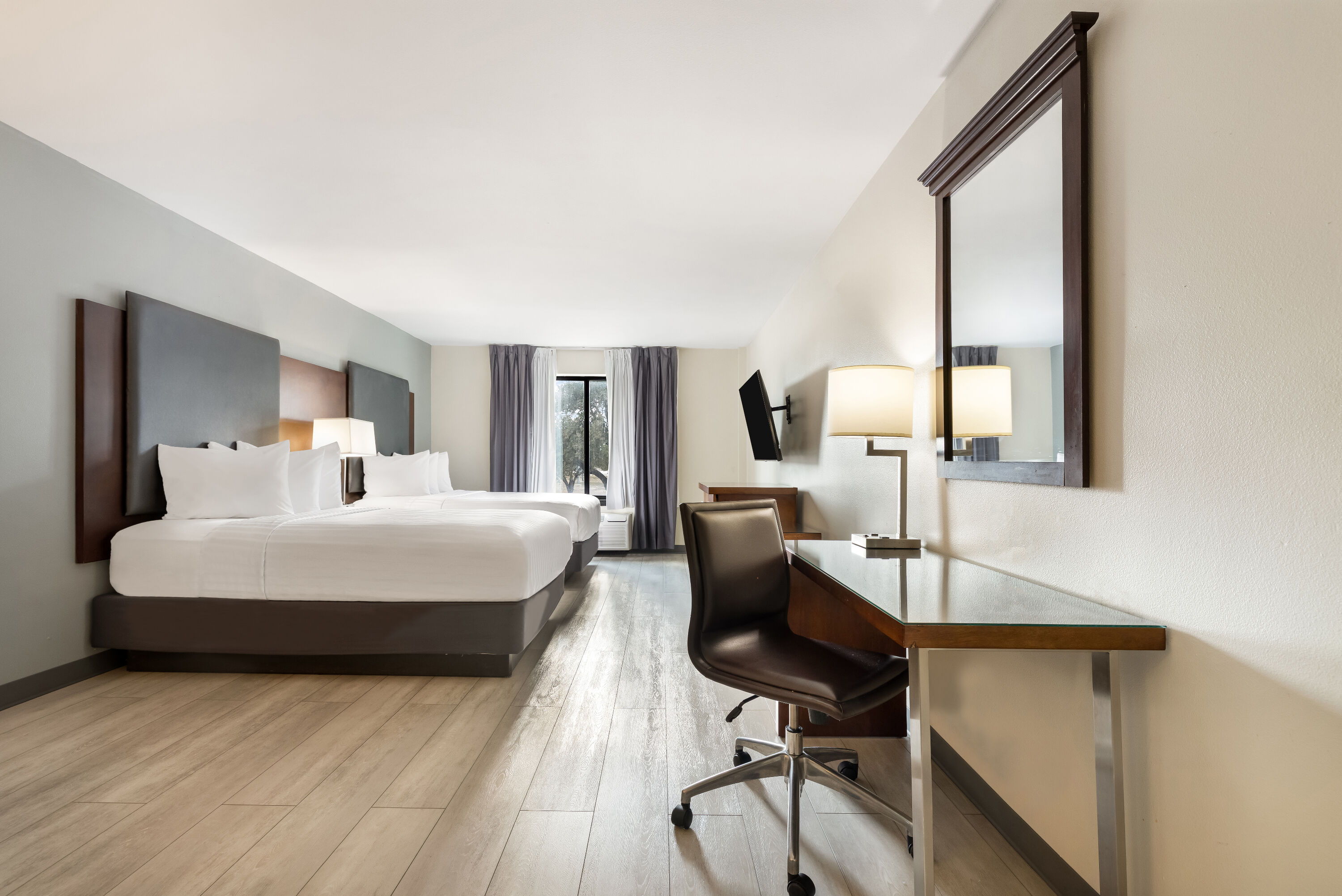 Double bed guest room at the Wingate by Wyndham Round Rock Hotel & Conference Center in Round Rock, Texas