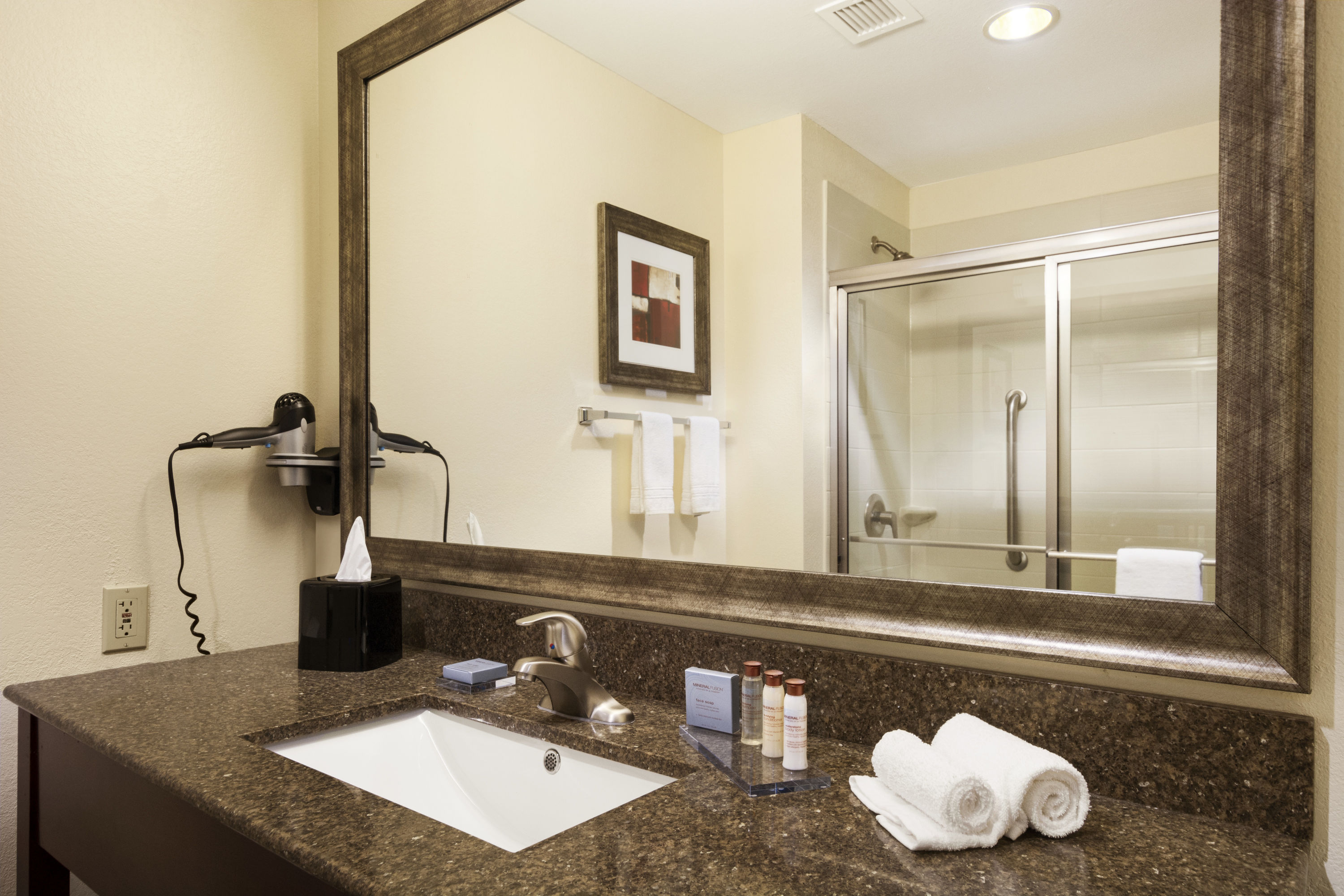 Guest room bath at the Wingate by Wyndham San Marcos in San Marcos, Texas
