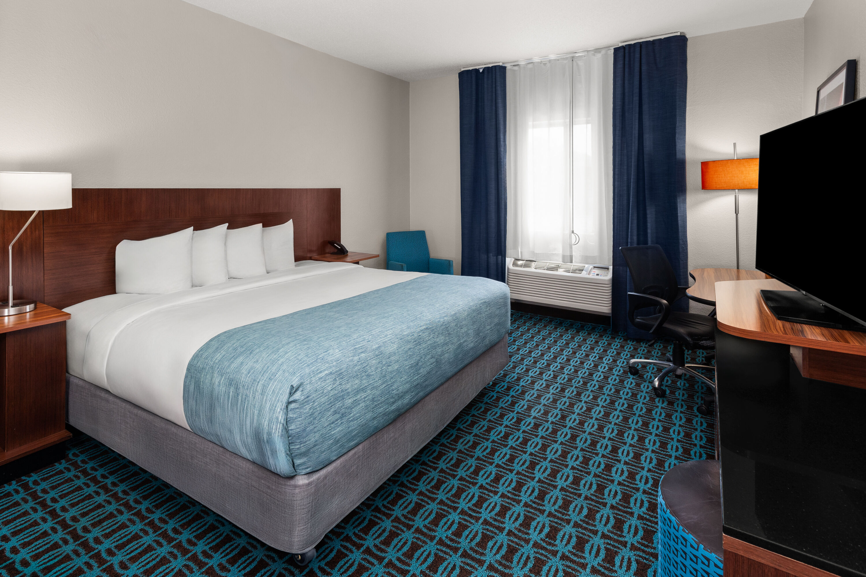 Guest room at the Wingate by Wyndham Oshkosh in Oshkosh, Wisconsin