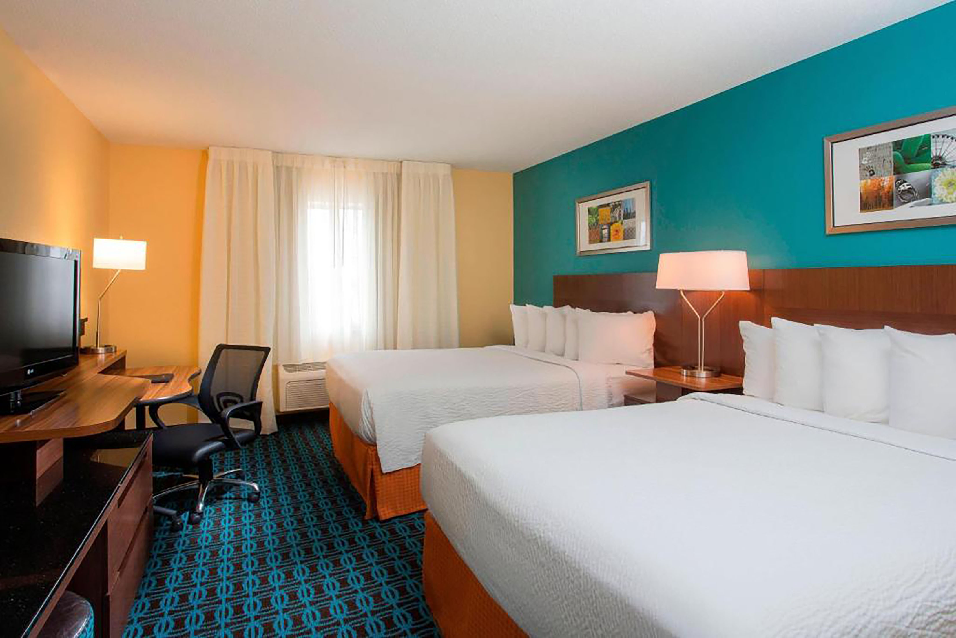 Guest room at the Wingate by Wyndham Oshkosh in Oshkosh, Wisconsin