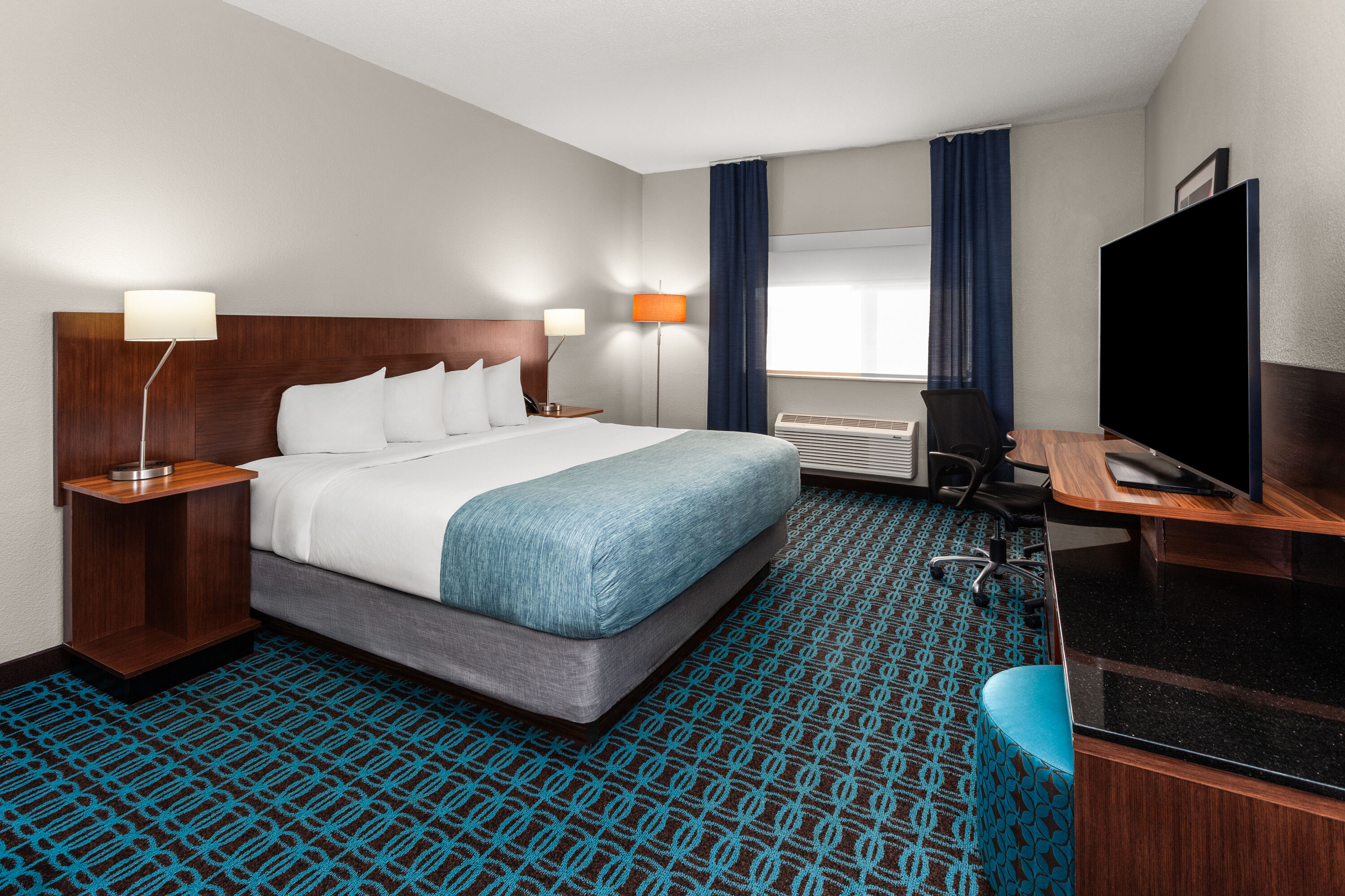 Guest room at the Wingate by Wyndham Oshkosh in Oshkosh, Wisconsin
