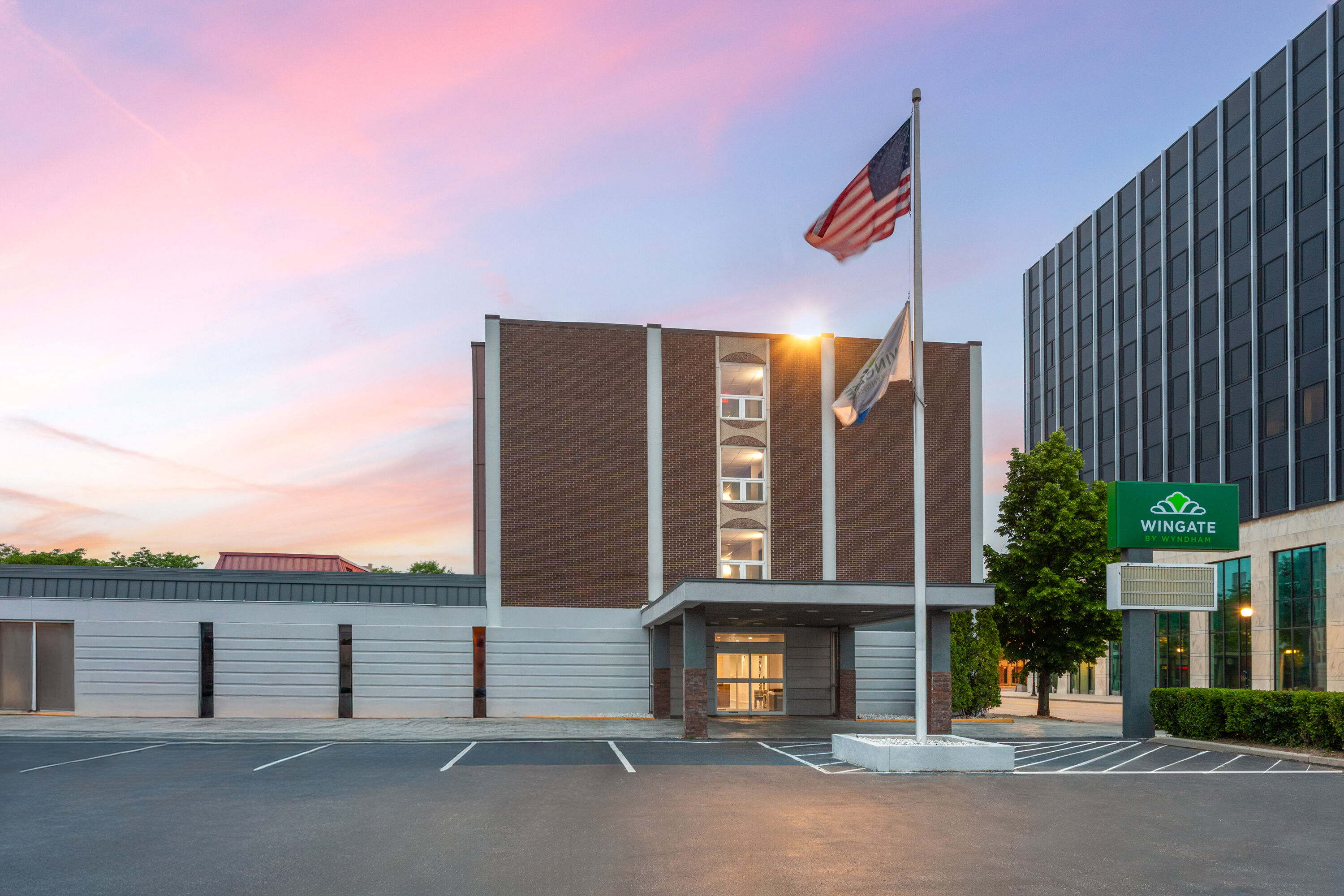 Exterior Dusk Image of Wingate by Wyndham Sheboygan hotel in Sheboygan, Wisconsin