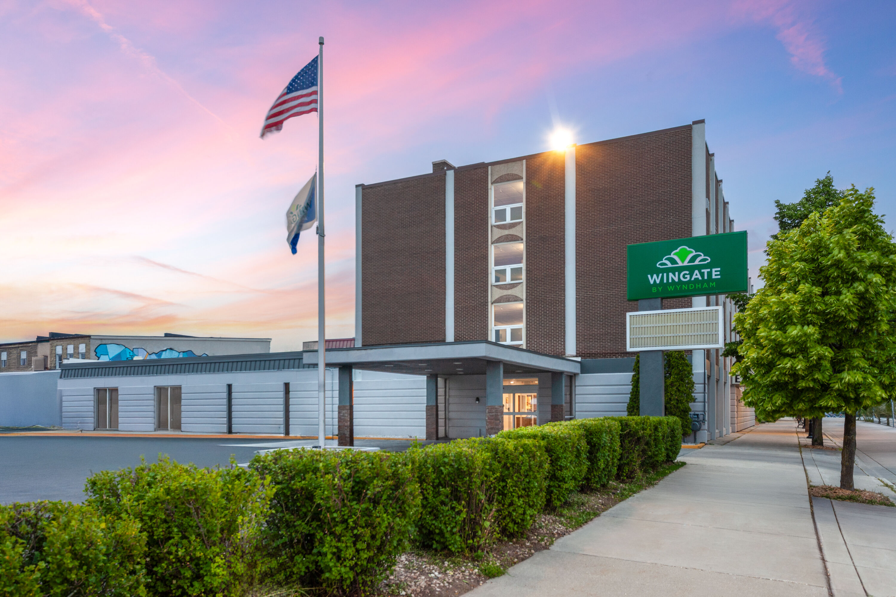 Exterior Dusk Image of Wingate by Wyndham Sheboygan hotel in Sheboygan, Wisconsin