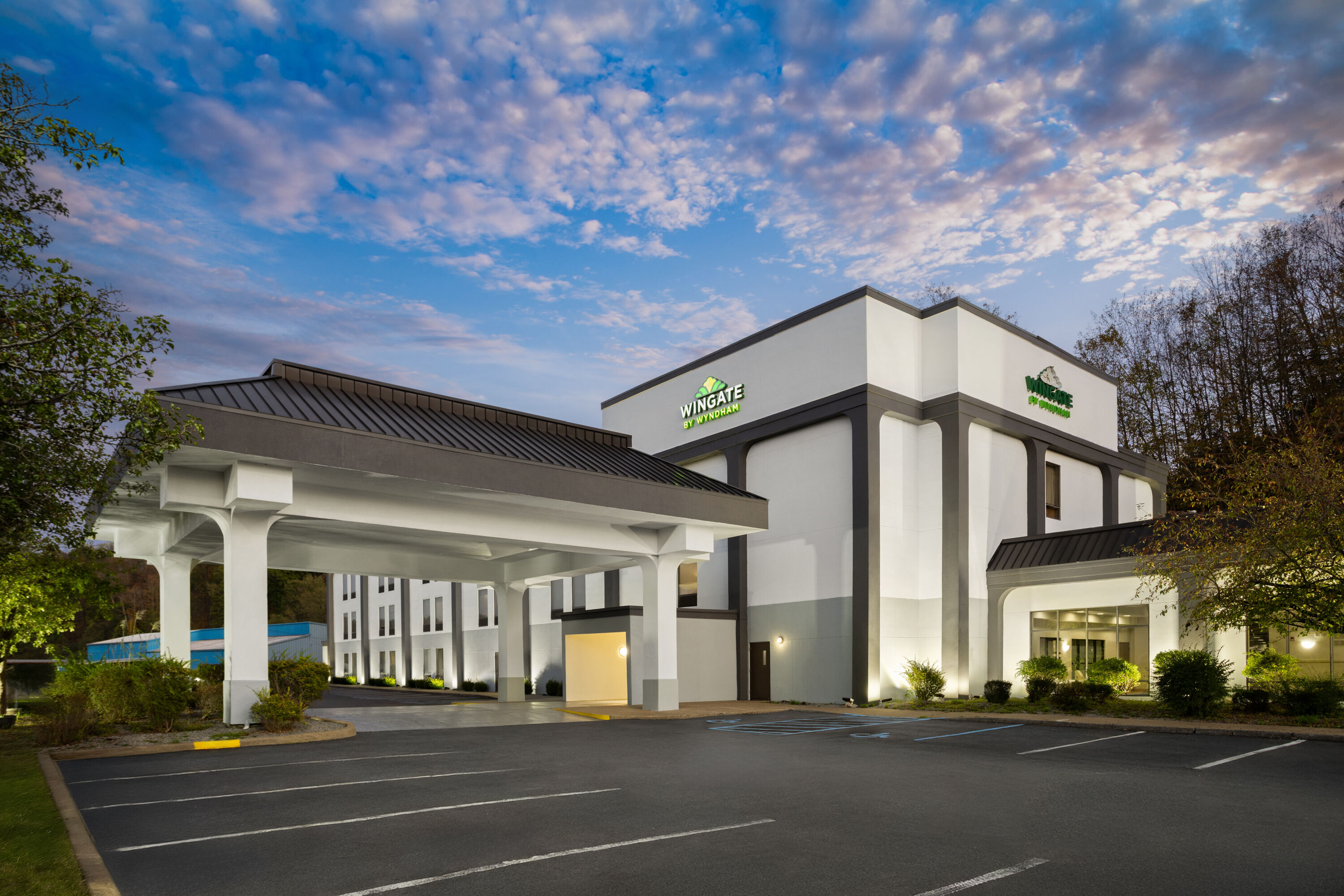 Exterior Dusk Image of Wingate by Wyndham Buckhannon hotel in Buckhannon, West Virginia