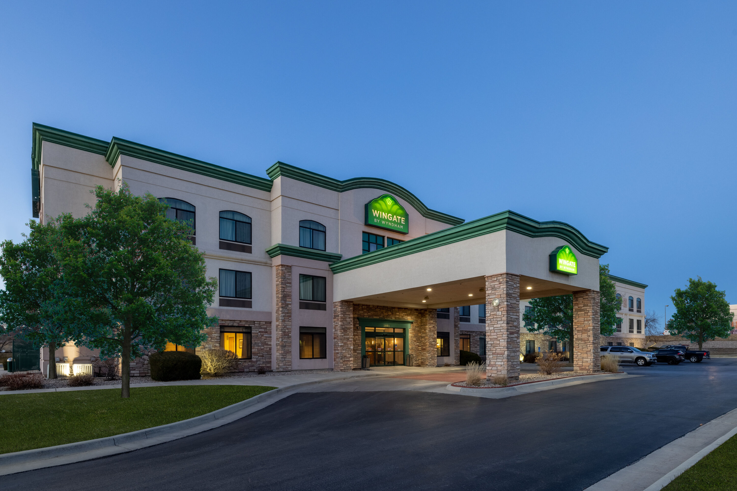 Exterior Dusk Image of Wingate by Wyndham Gillette hotel in Gillette, Wyoming