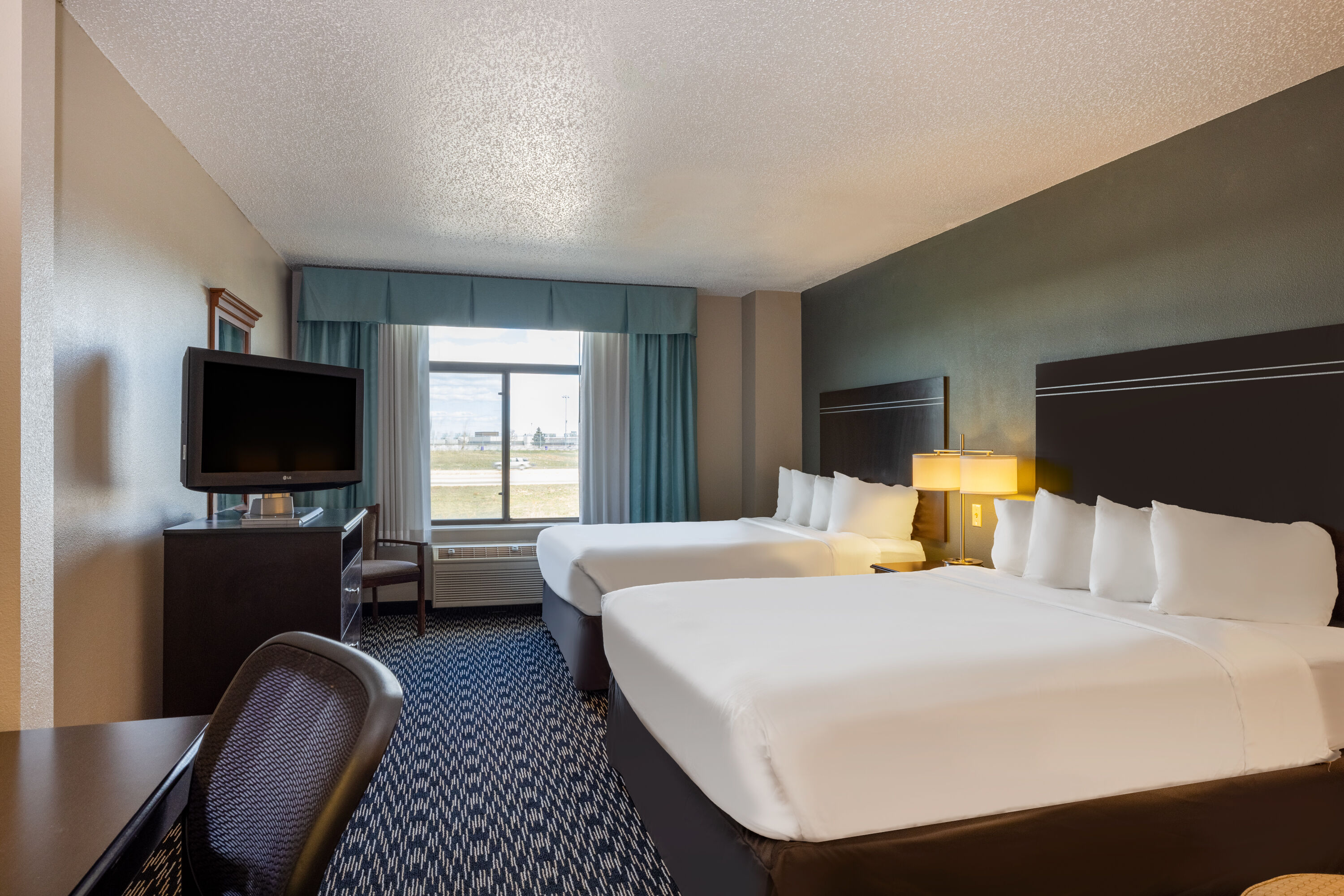 Guest room at the Wingate by Wyndham Gillette in Gillette, Wyoming